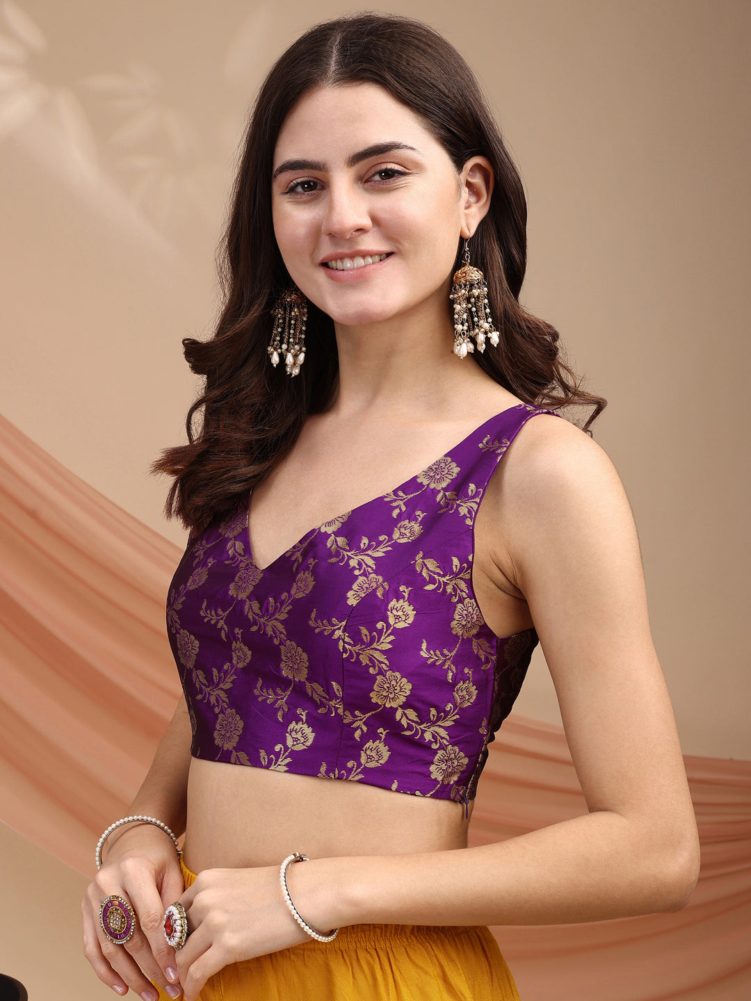 Purple colour brocade sleeveless blouse