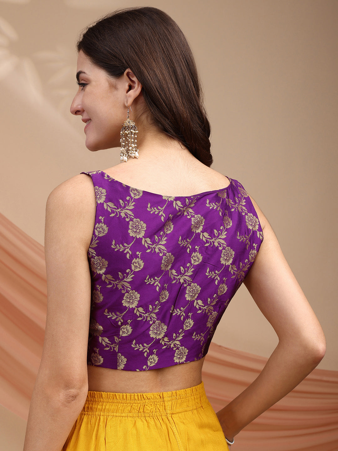 Purple colour brocade sleeveless blouse