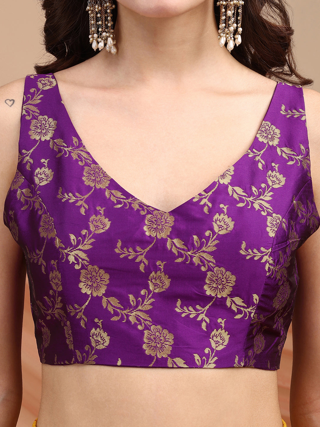 Purple colour brocade sleeveless blouse