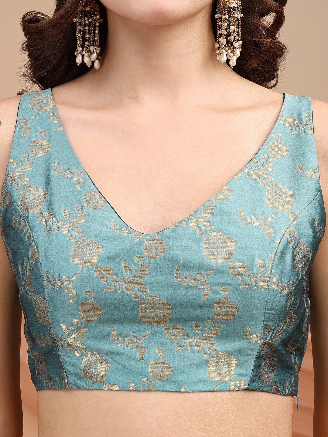 Blue colour brocade sleeveless blouse