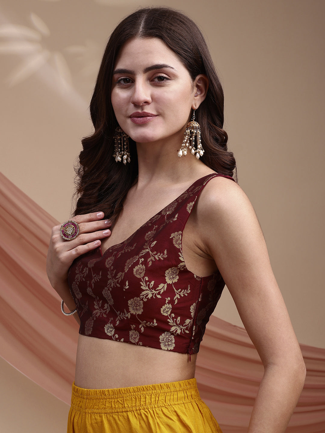 Maroon colour brocade sleeveless blouse