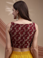 Maroon colour brocade sleeveless blouse