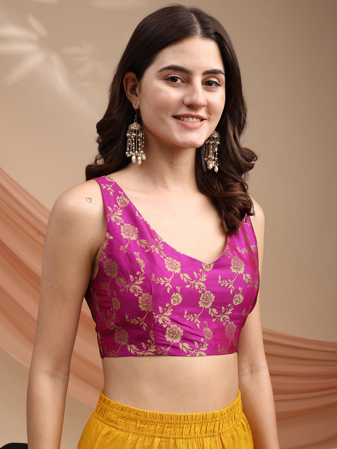Pink colour brocade sleeveless blouse
