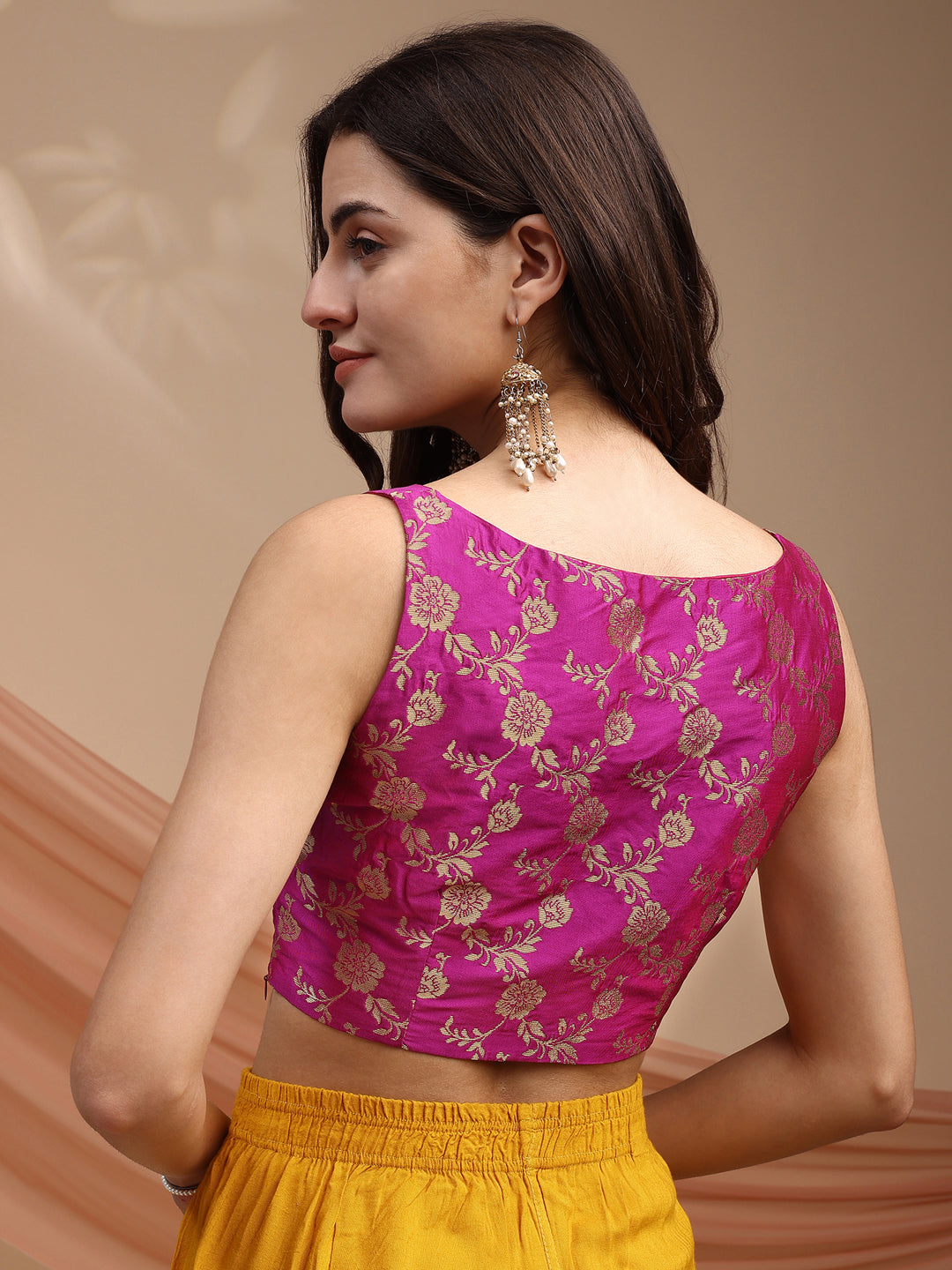 Pink colour brocade sleeveless blouse