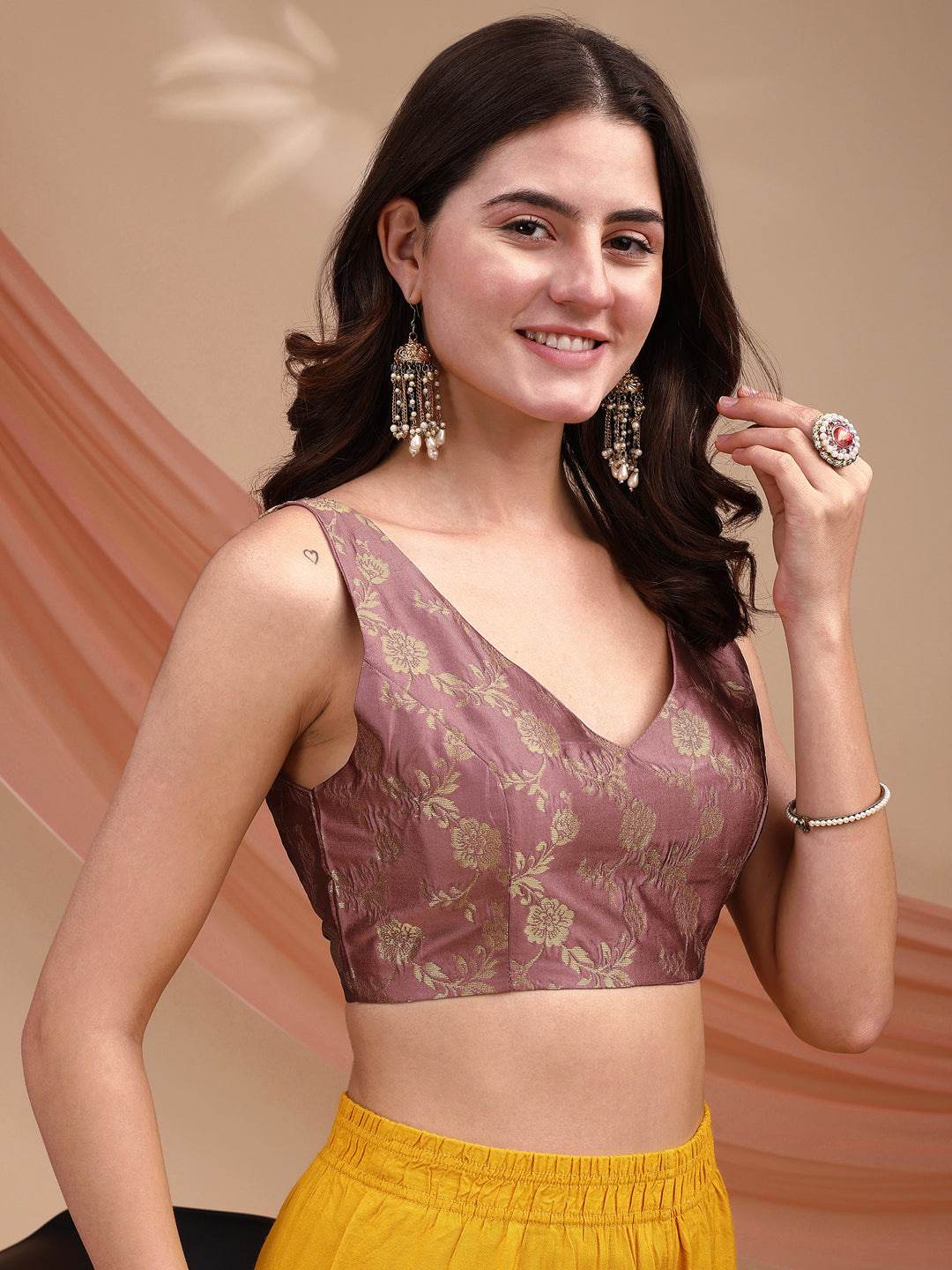 Lavendar colour brocade sleeveless blouse