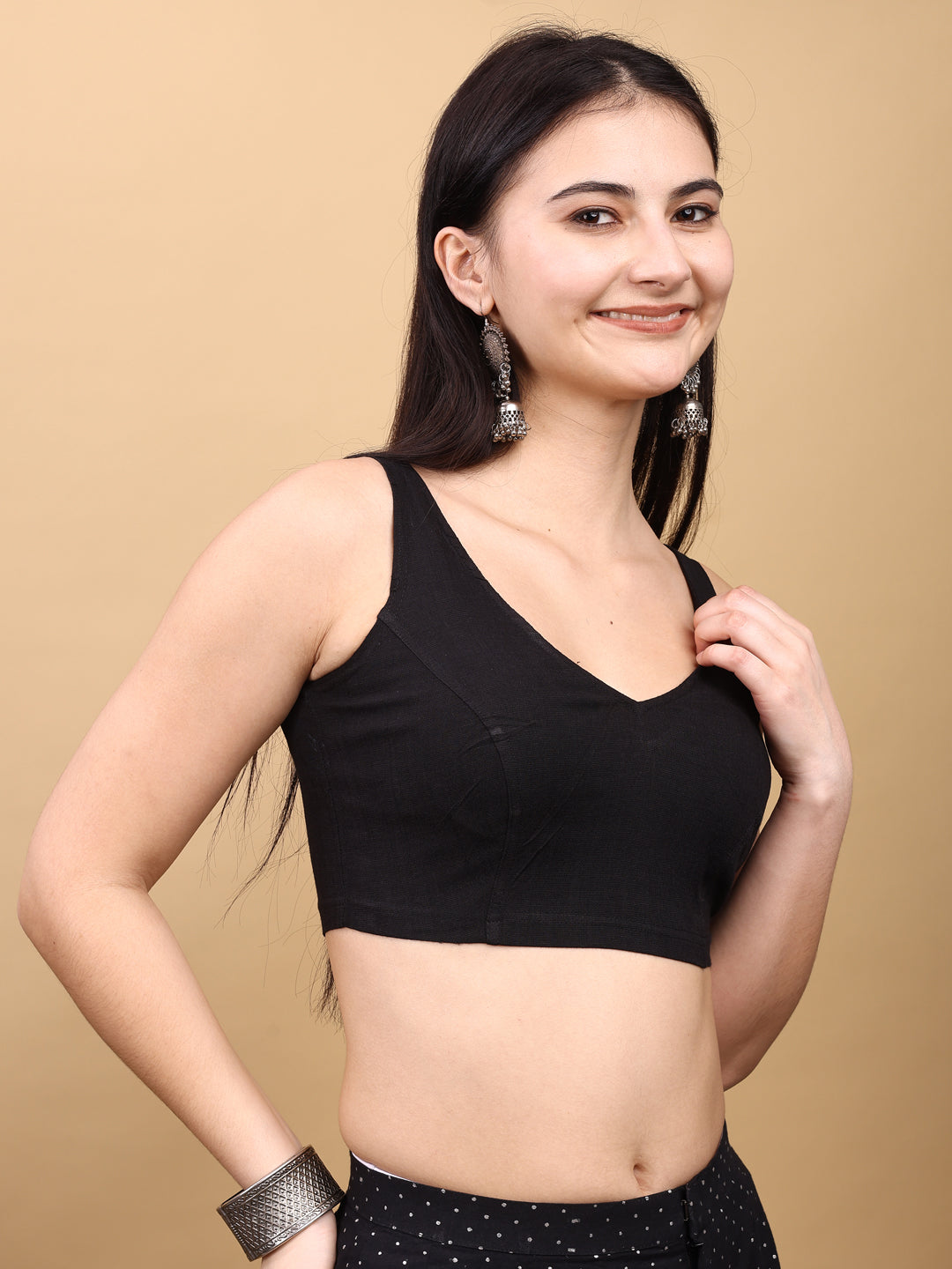 Black colored lycra v neck blouse