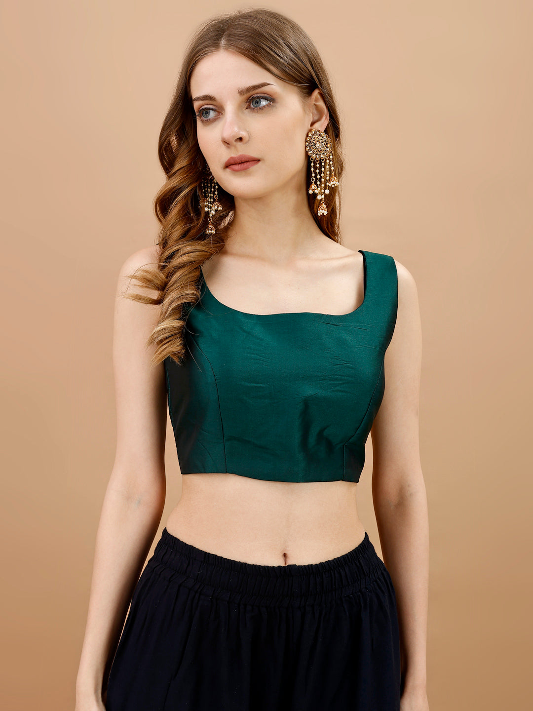 Green colored sleeveless tafeta blouse