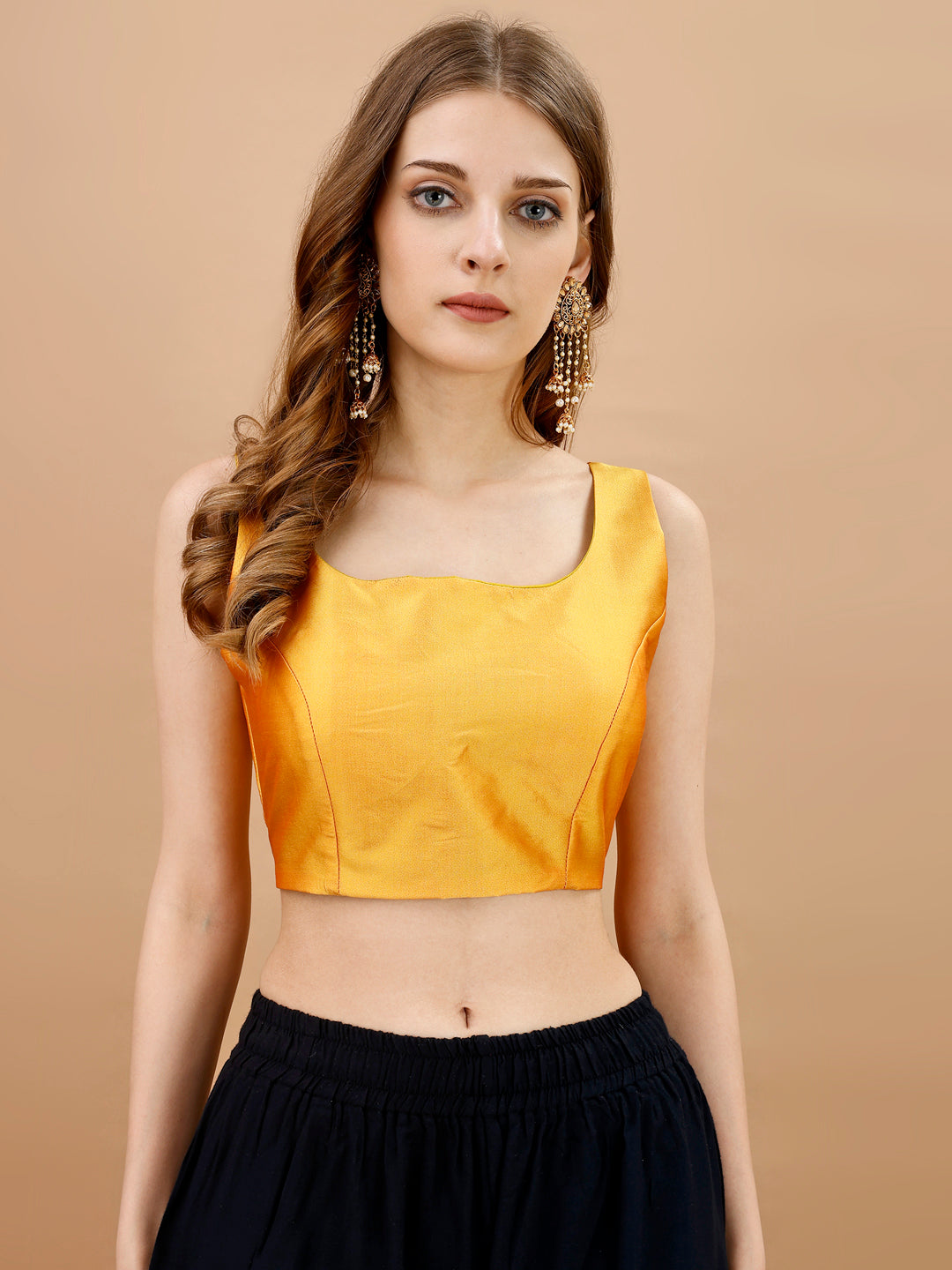 Yellow colored sleeveless tafeta blouse