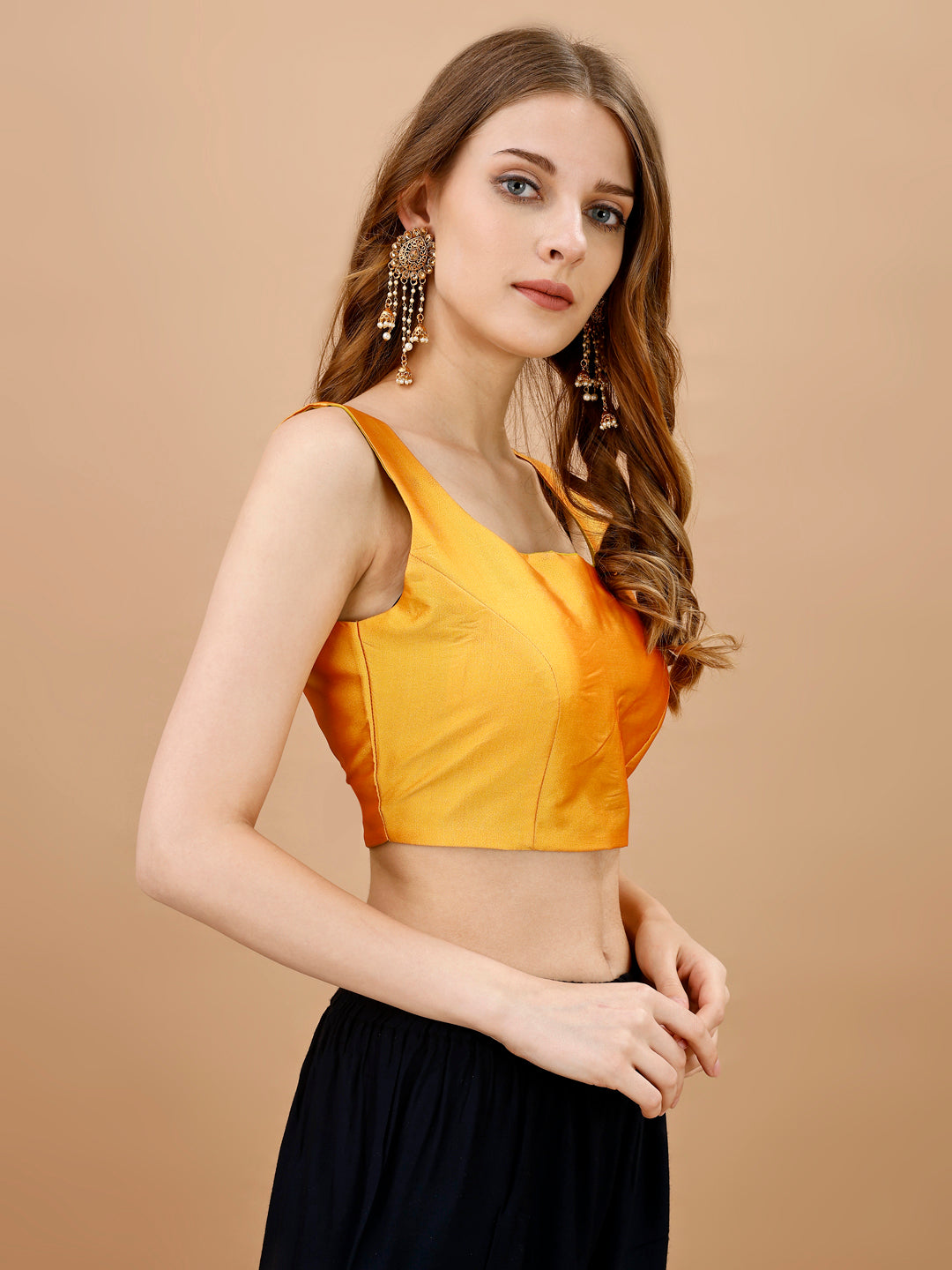 Yellow colored sleeveless tafeta blouse