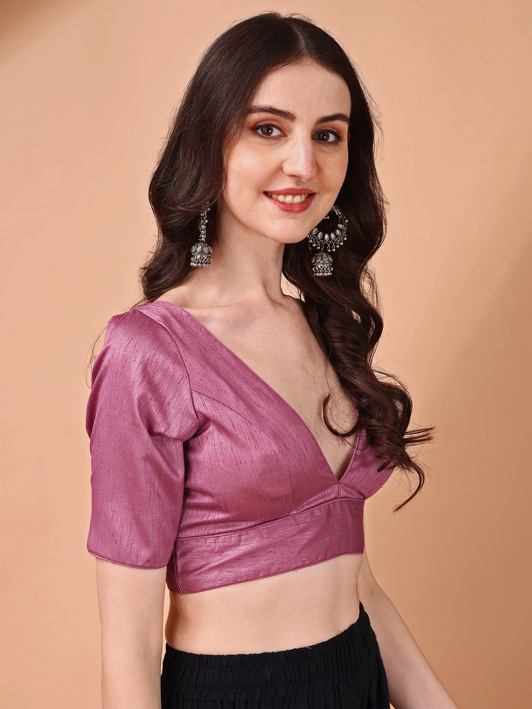 Pink colored half sleeves v neck blouse