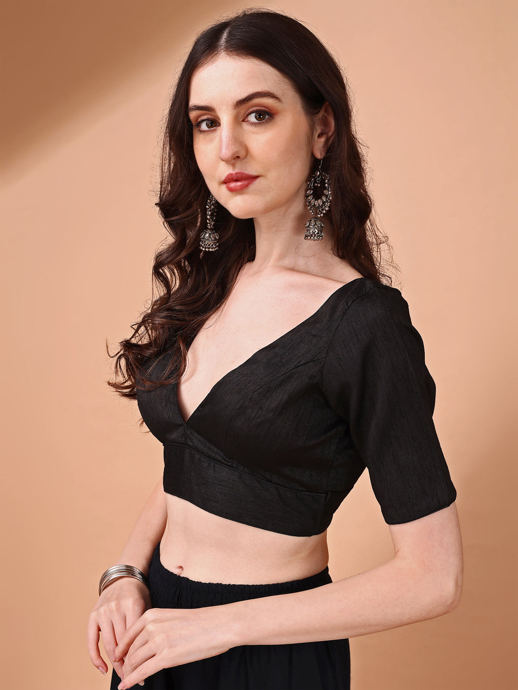 Black colored half sleeves v neck blouse