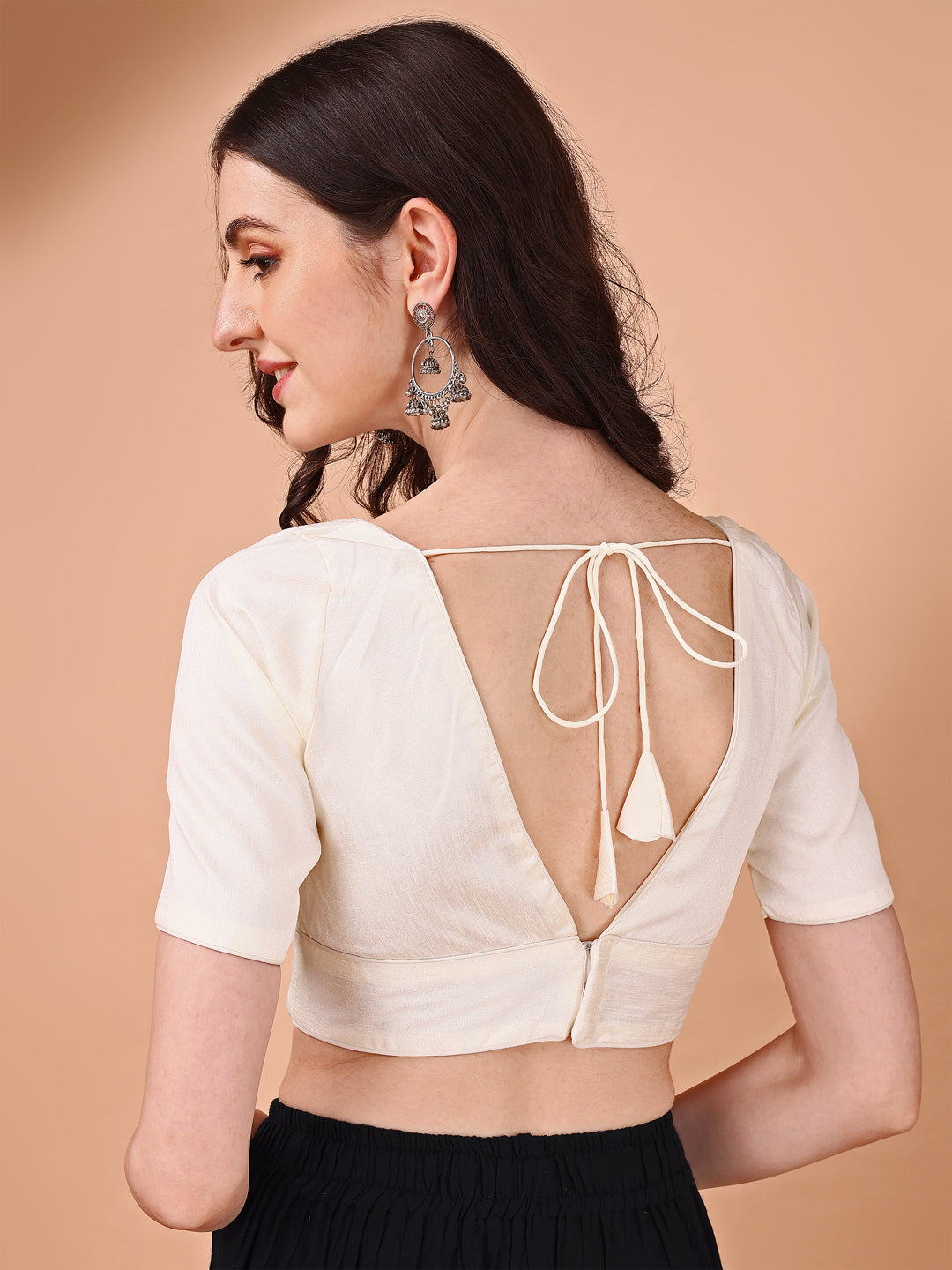 White colored half sleeves v neck blouse