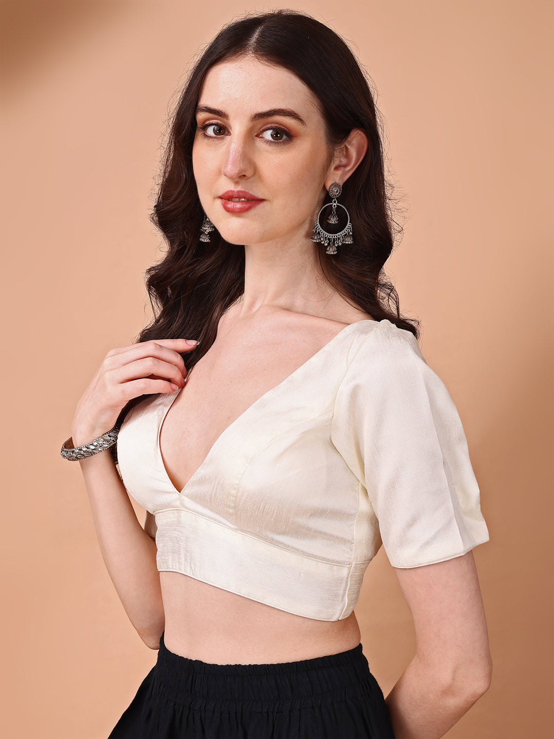 White colored half sleeves v neck blouse