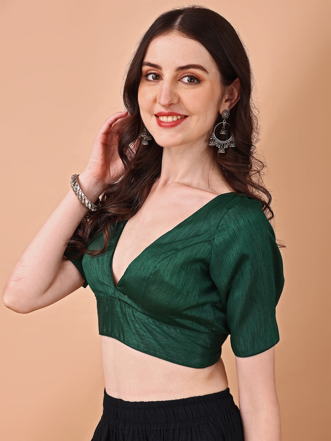 Green colored half sleeves v neck blouse