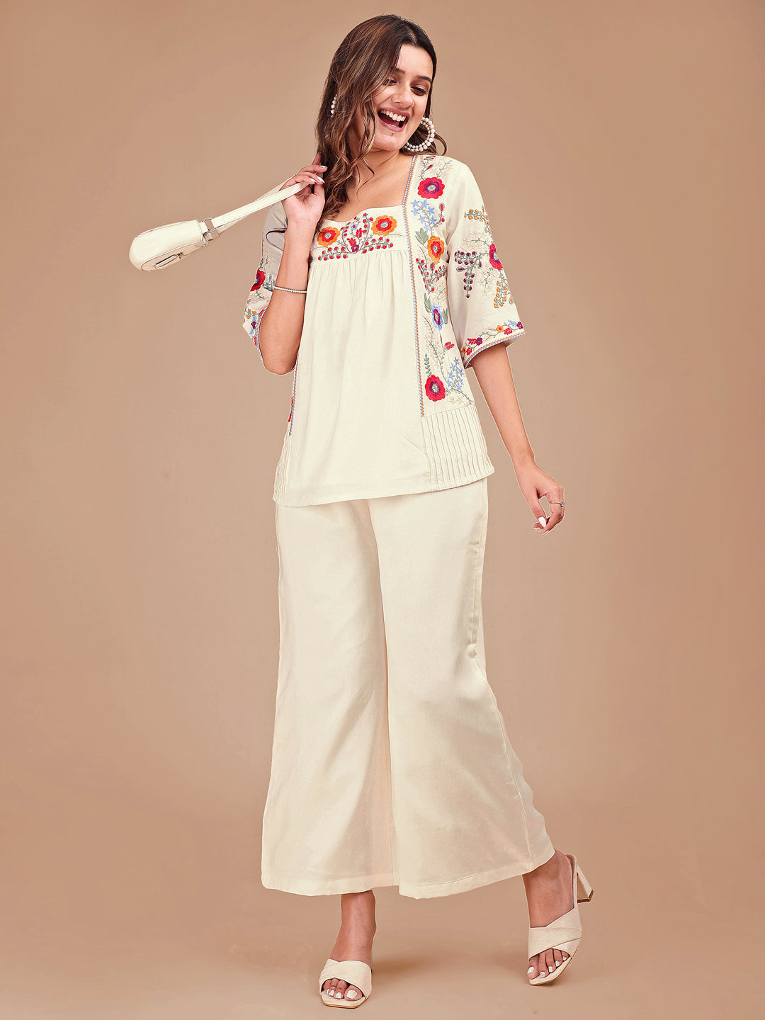Off White Colored Chic Embroidered Rayon Tunic & Flared Pant Co-ord Set