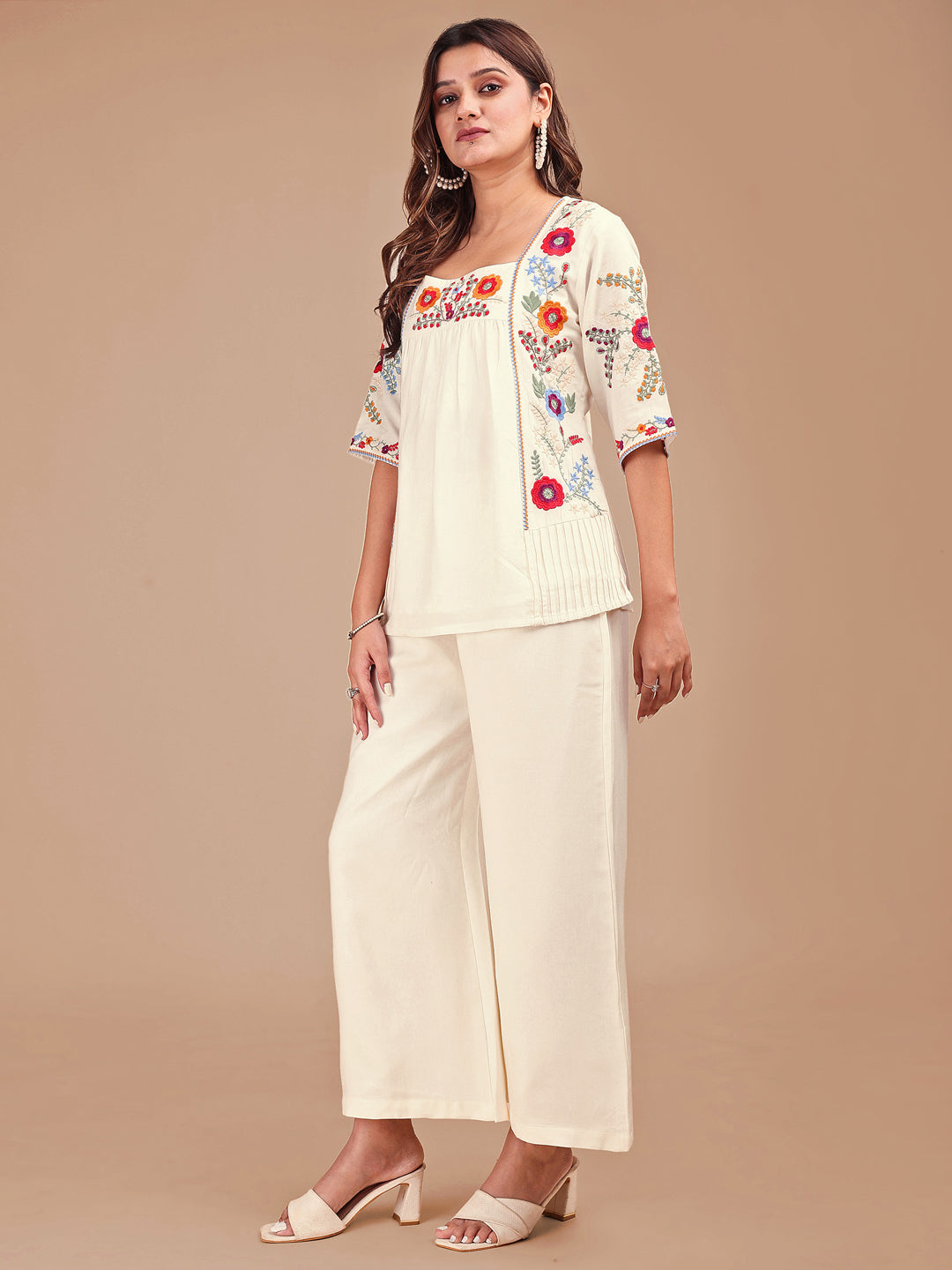 Off White Colored Chic Embroidered Rayon Tunic & Flared Pant Co-ord Set