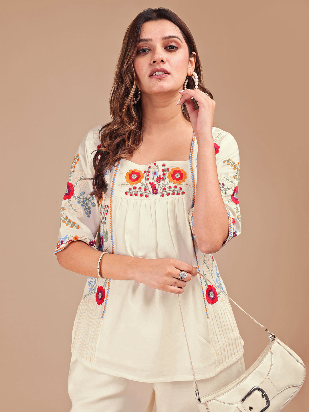 Off White Colored Chic Embroidered Rayon Tunic & Flared Pant Co-ord Set