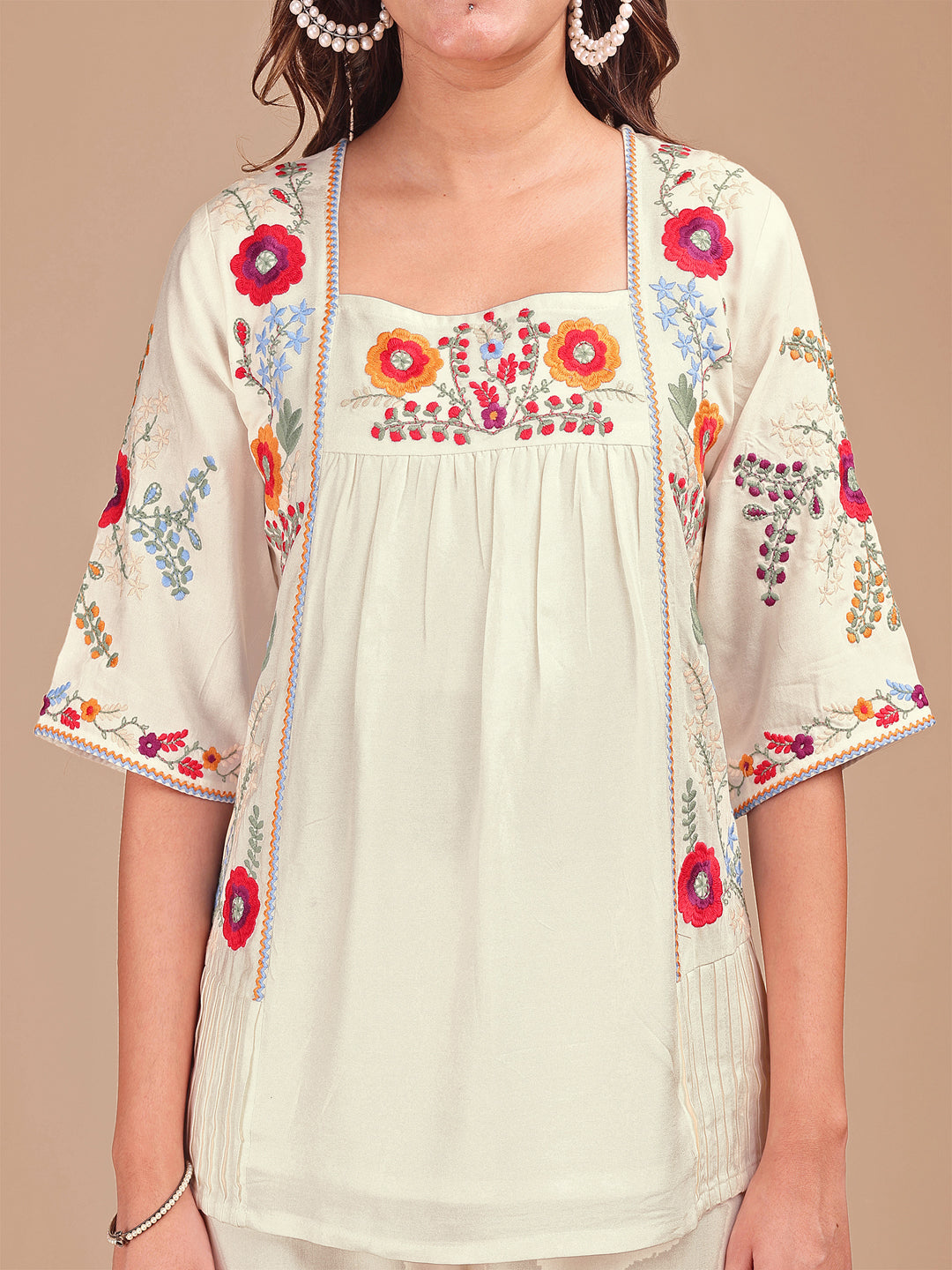 Off White Colored Chic Embroidered Rayon Tunic & Flared Pant Co-ord Set