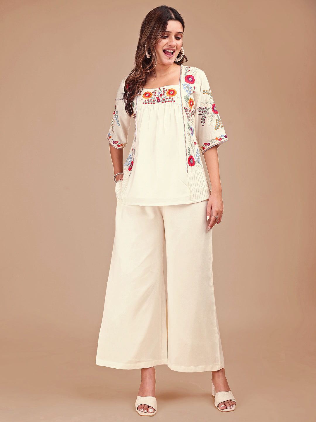 Off White Colored Chic Embroidered Rayon Tunic & Flared Pant Co-ord Set