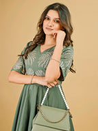 Tikhi Imli Sage green silk blend with thread work embroidered top and plazzo Co-ord Set