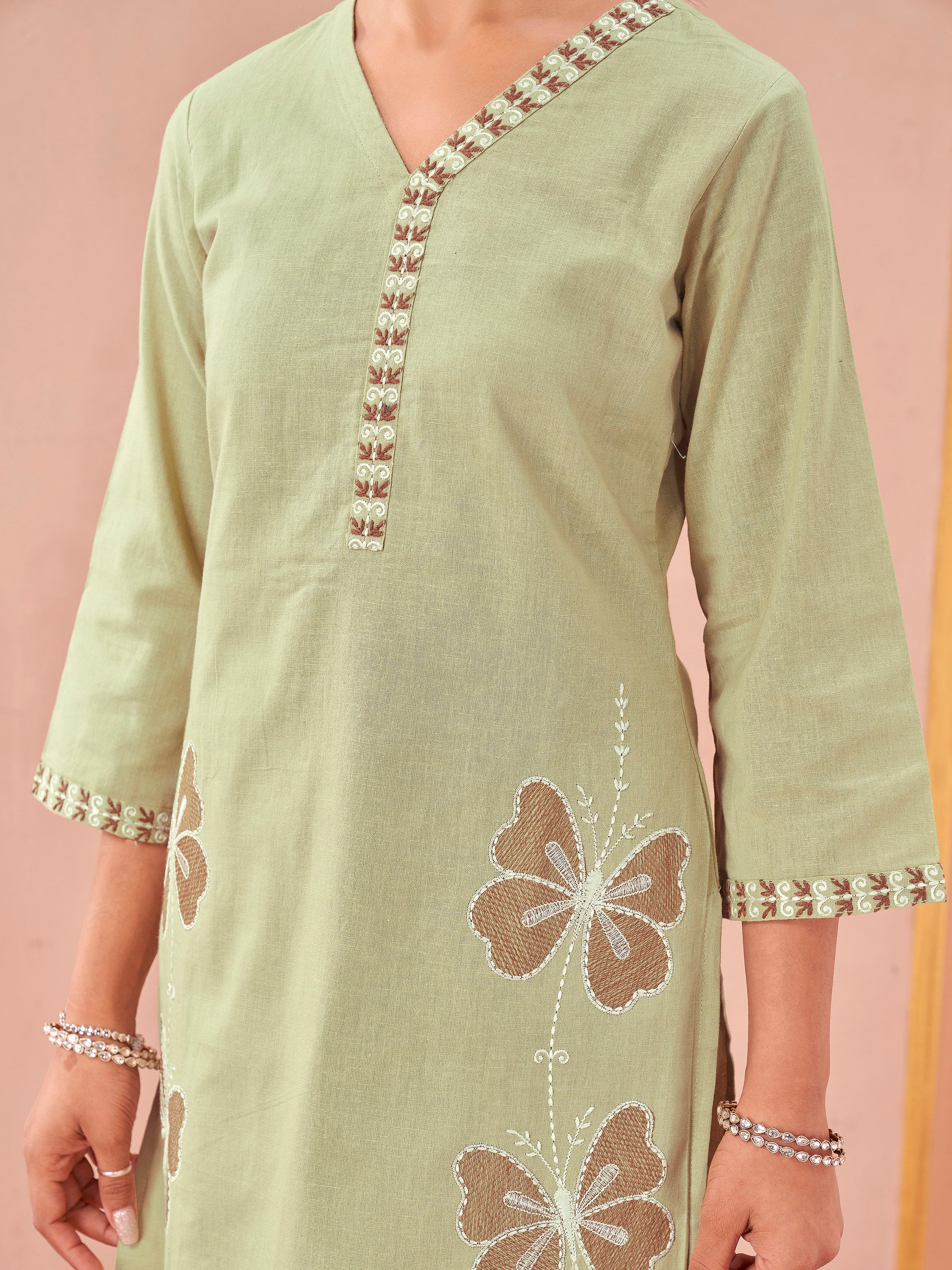 Pista color linen with contrast thread butterfly embroidered kurta and trouser co-ord set