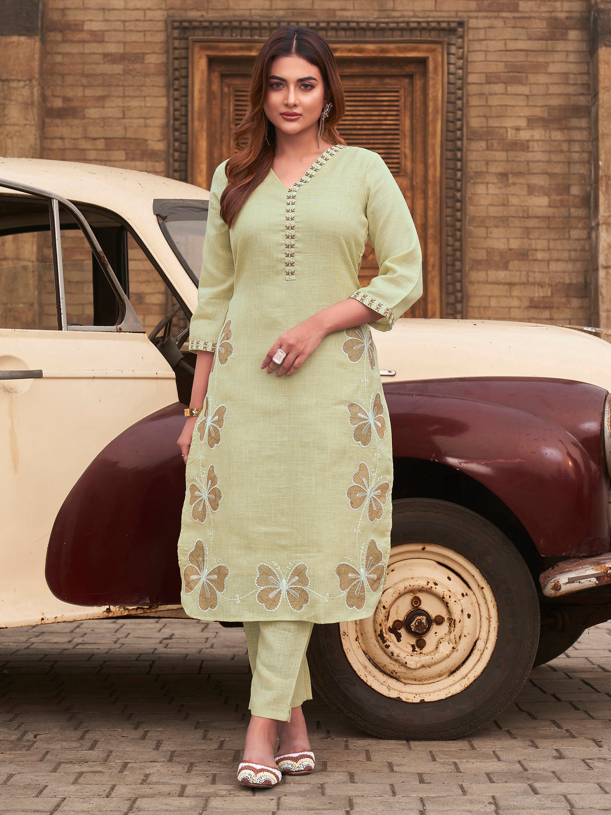 Pista Green color linen with contrast thread butterfly embroidered kurta and trouser co-ord set