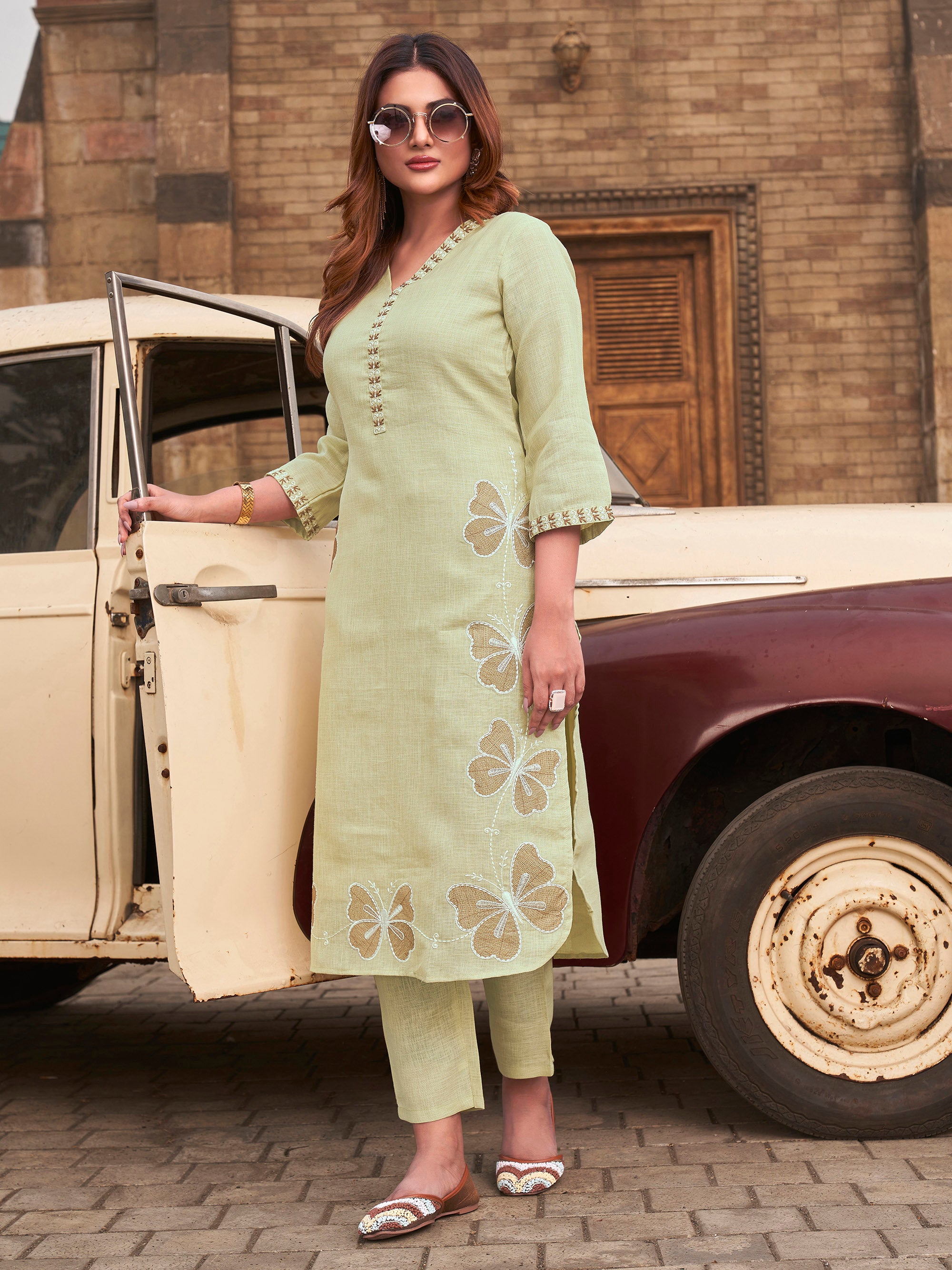 Pista Green color linen with contrast thread butterfly embroidered kurta and trouser co-ord set