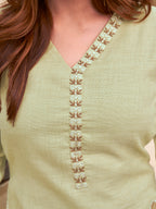 Pista Green color linen with contrast thread butterfly embroidered kurta and trouser co-ord set