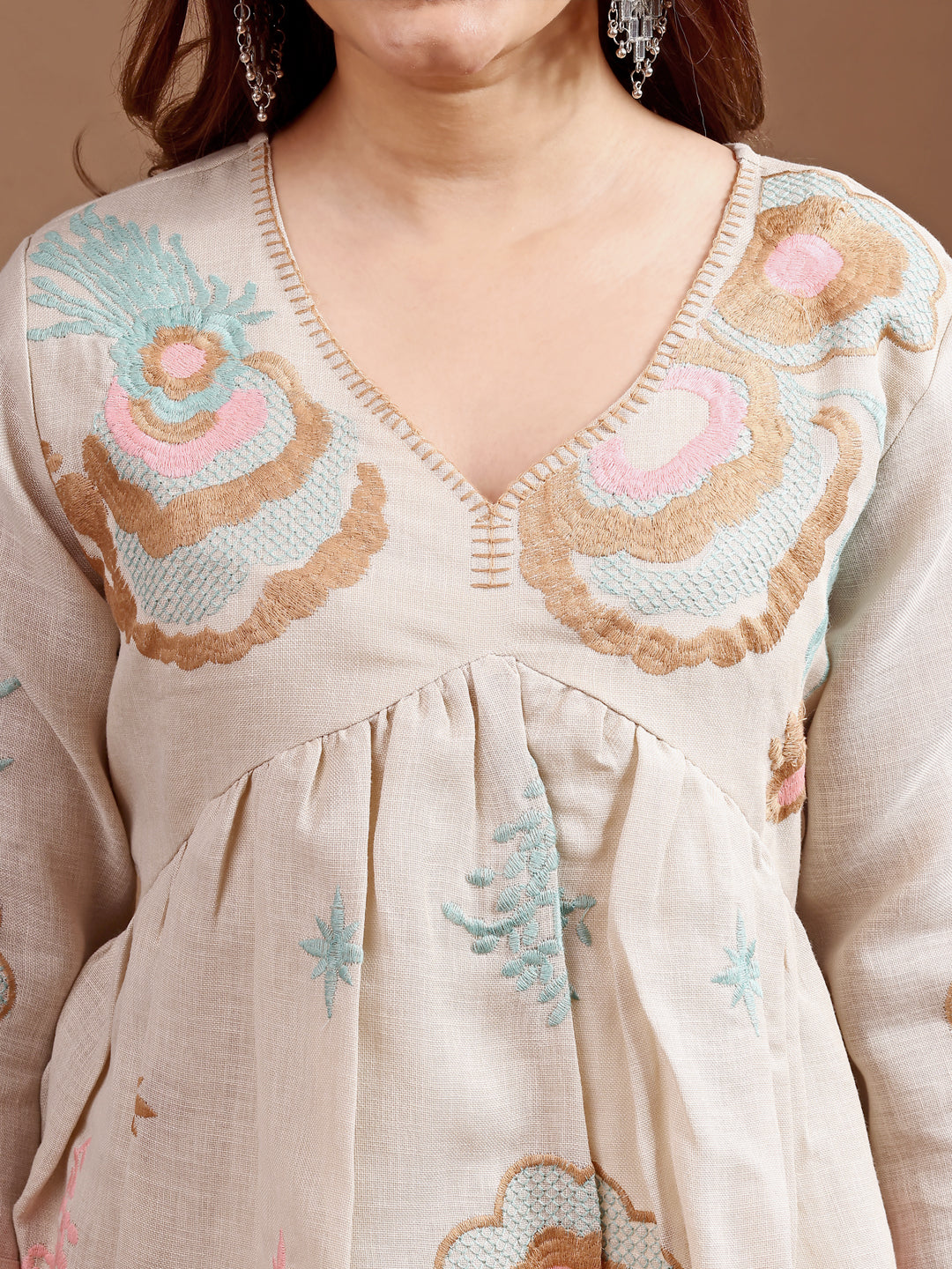 Beige colour linen multi thread embroidery flared tunic with trouser coord set