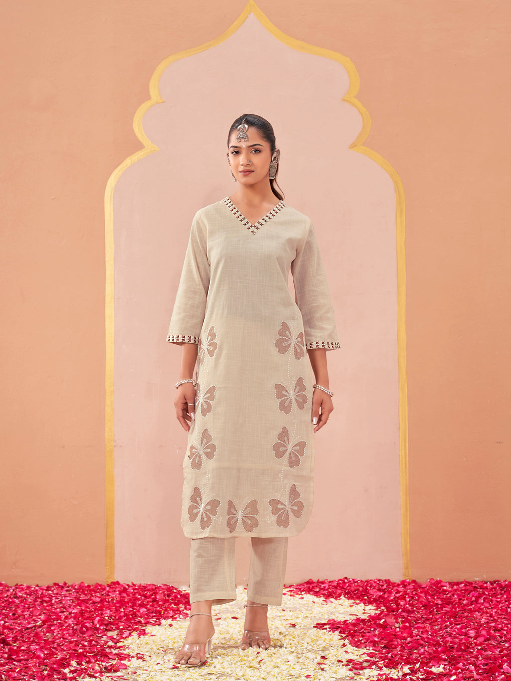 off-white color linen with contrast thread butterfly embroidered kurta and trouser co-ord set