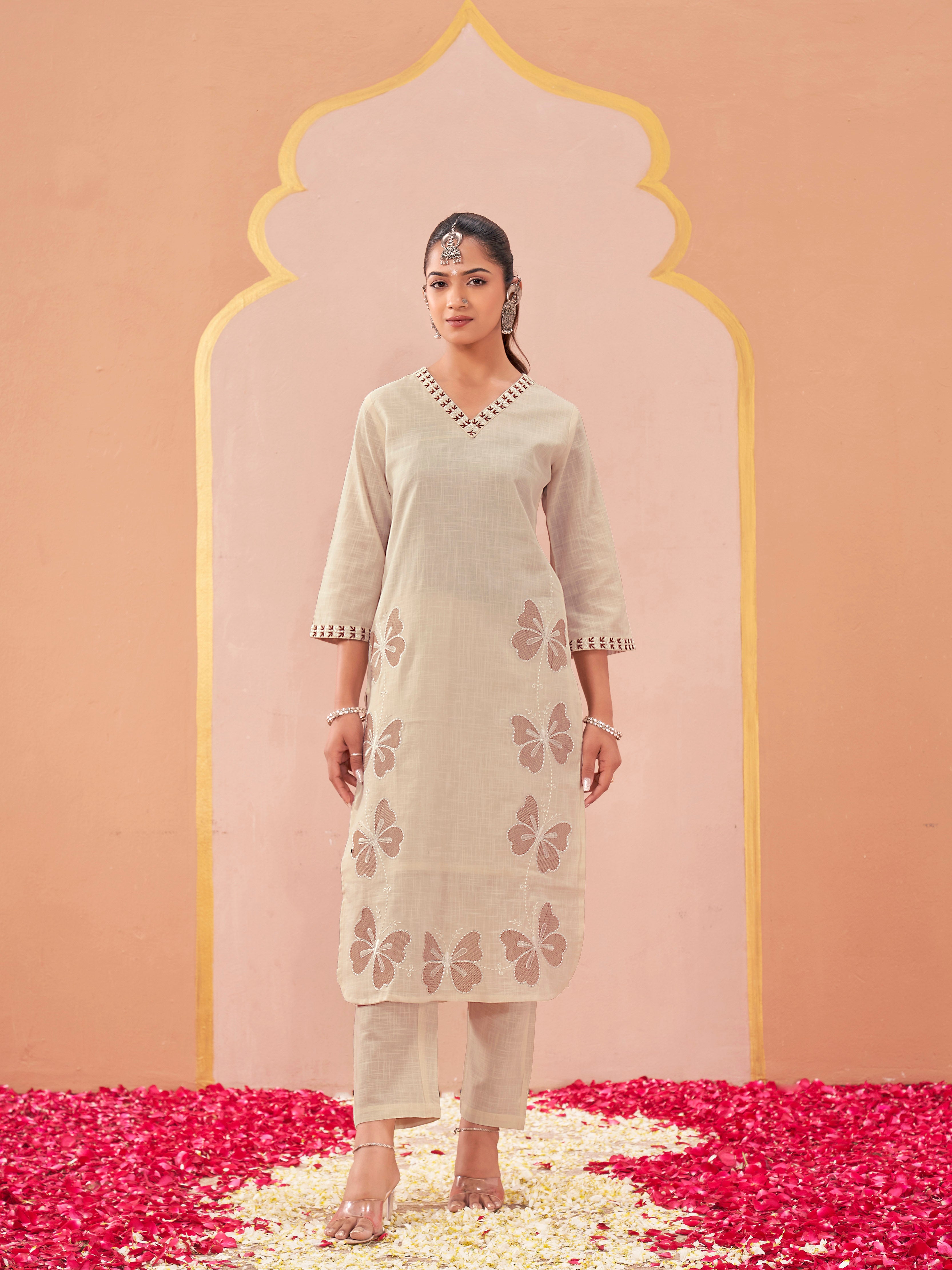 off-white color linen with contrast thread butterfly embroidered kurta and trouser co-ord set