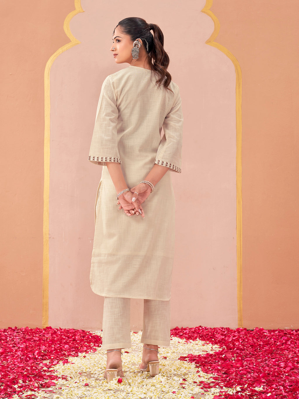 off-white color linen with contrast thread butterfly embroidered kurta and trouser co-ord set