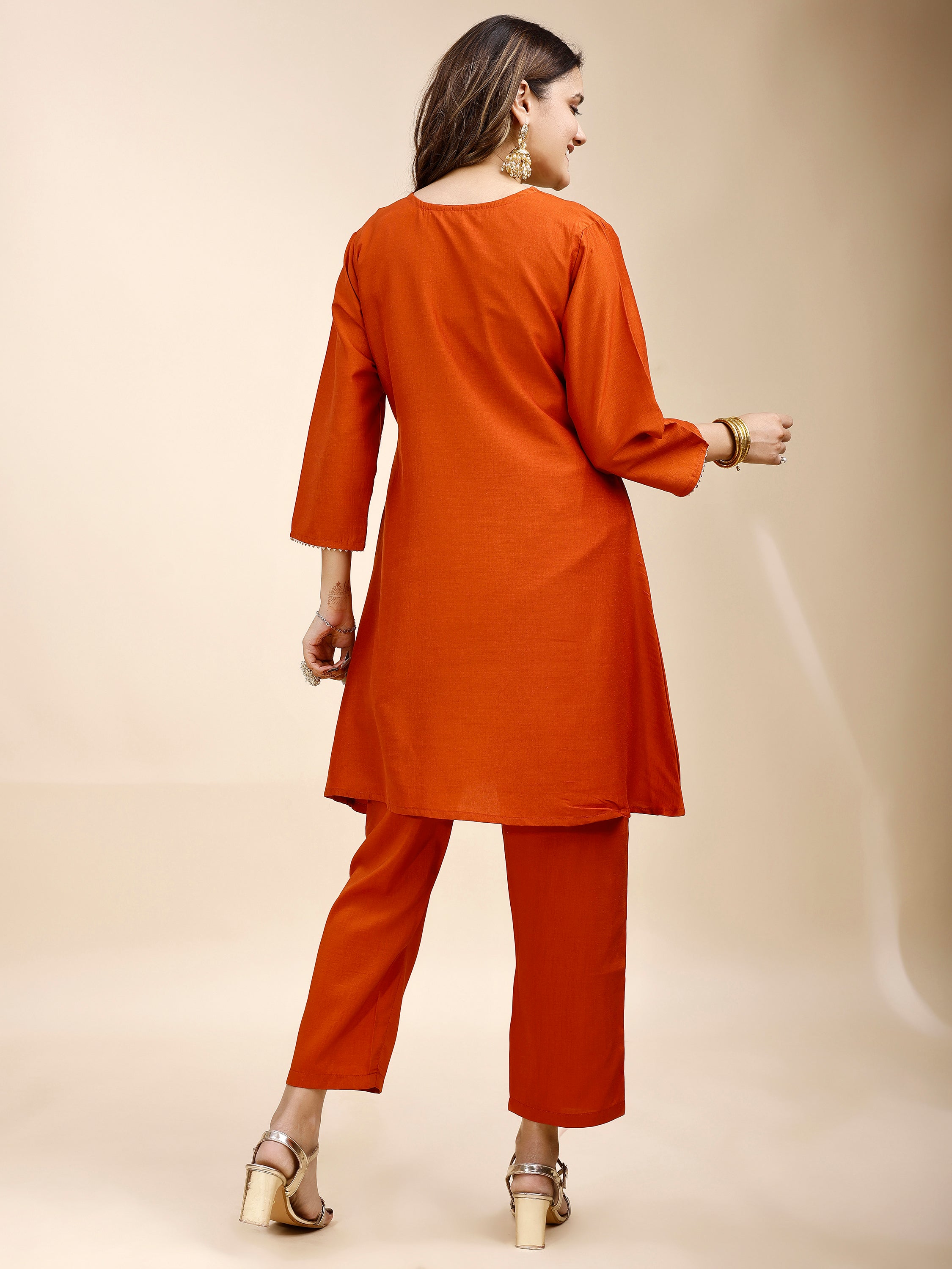 Tikhi Imli Rust color silk blend with zari work embroidered a line tunic and trouser Co-ord Set