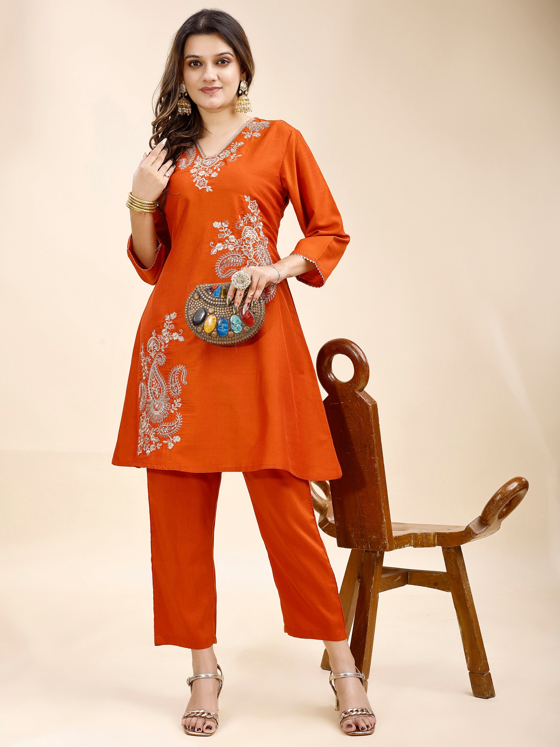 Tikhi Imli Rust color silk blend with zari work embroidered a line tunic and trouser Co-ord Set