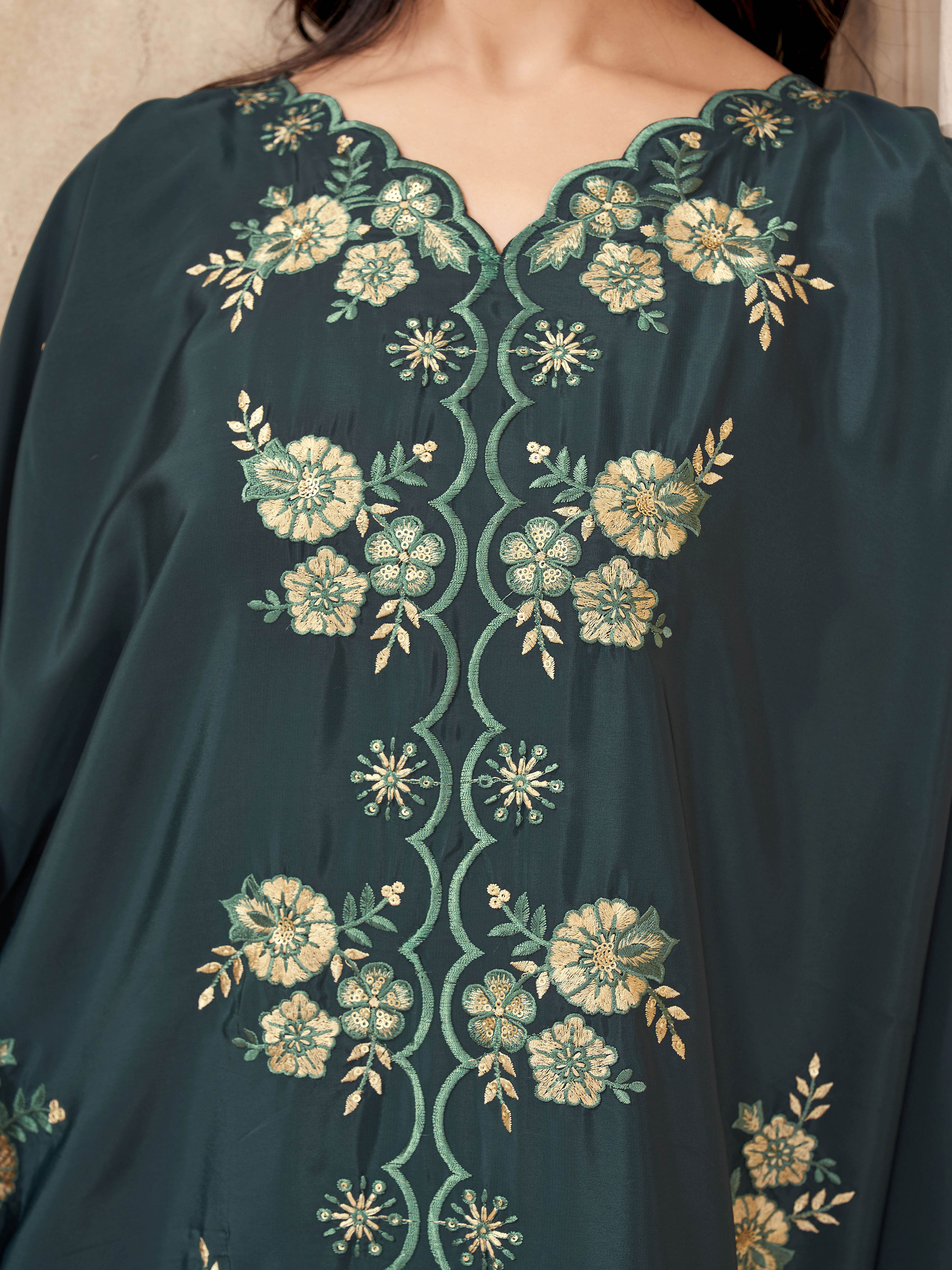 Bottle green color Crepe with multi thread work embroidered over size tunic and trouser cordset