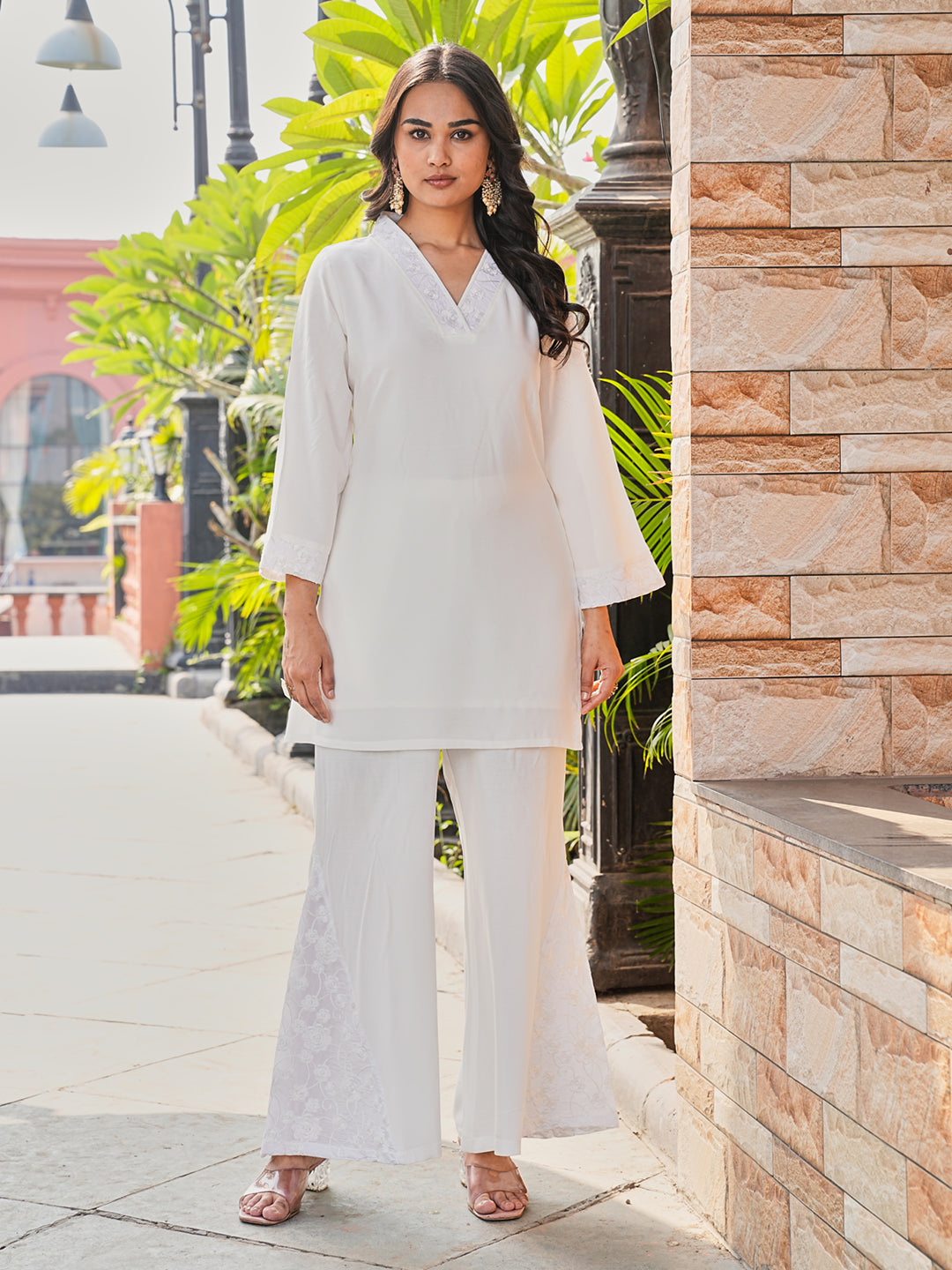 White color rayon with thread work embroidered bell sleeve top and boot cut co-ords set