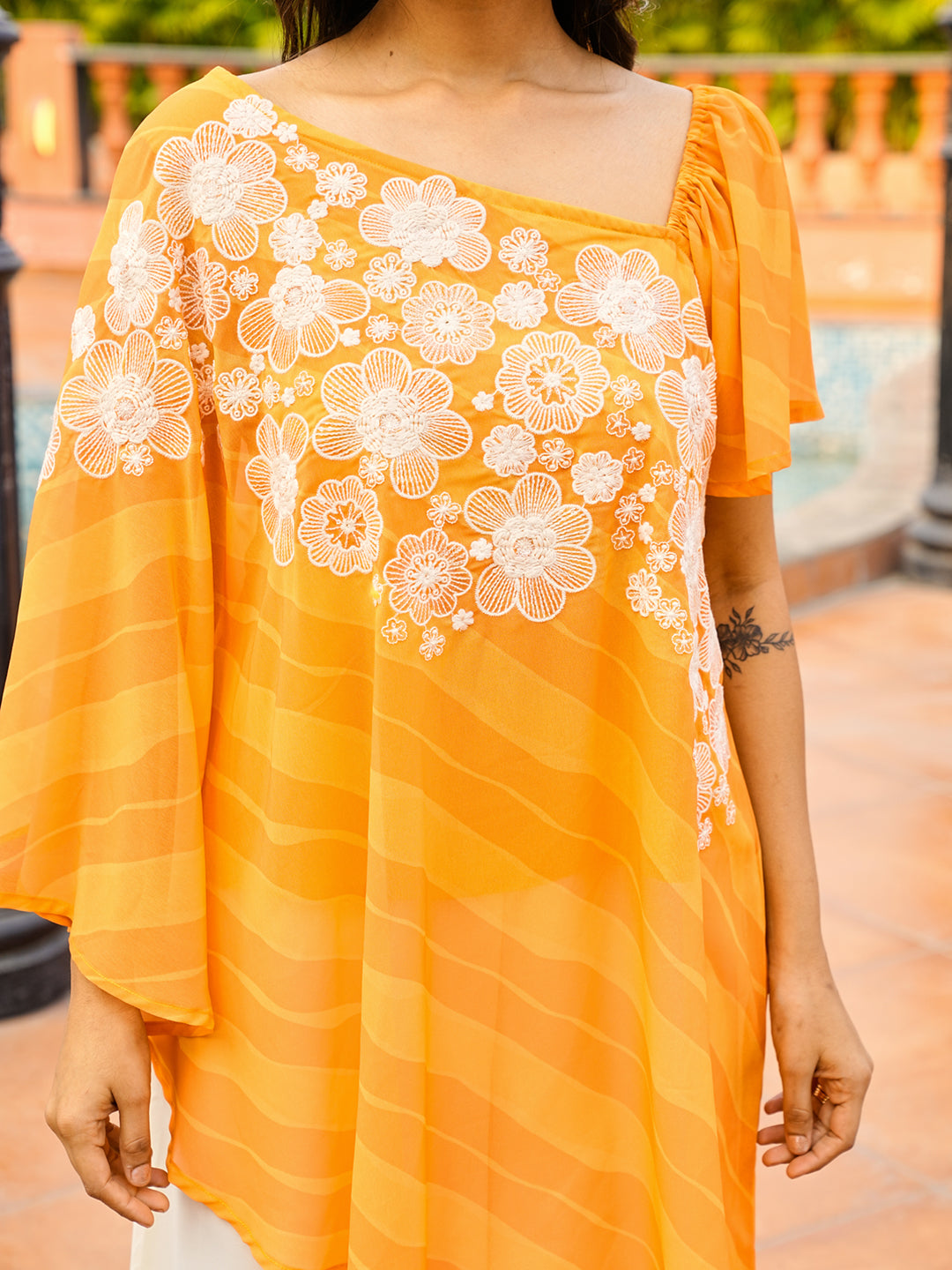 Orange color printed georgette with thread & sequinned embroidered up & down top & A-line plazzo co-ords set