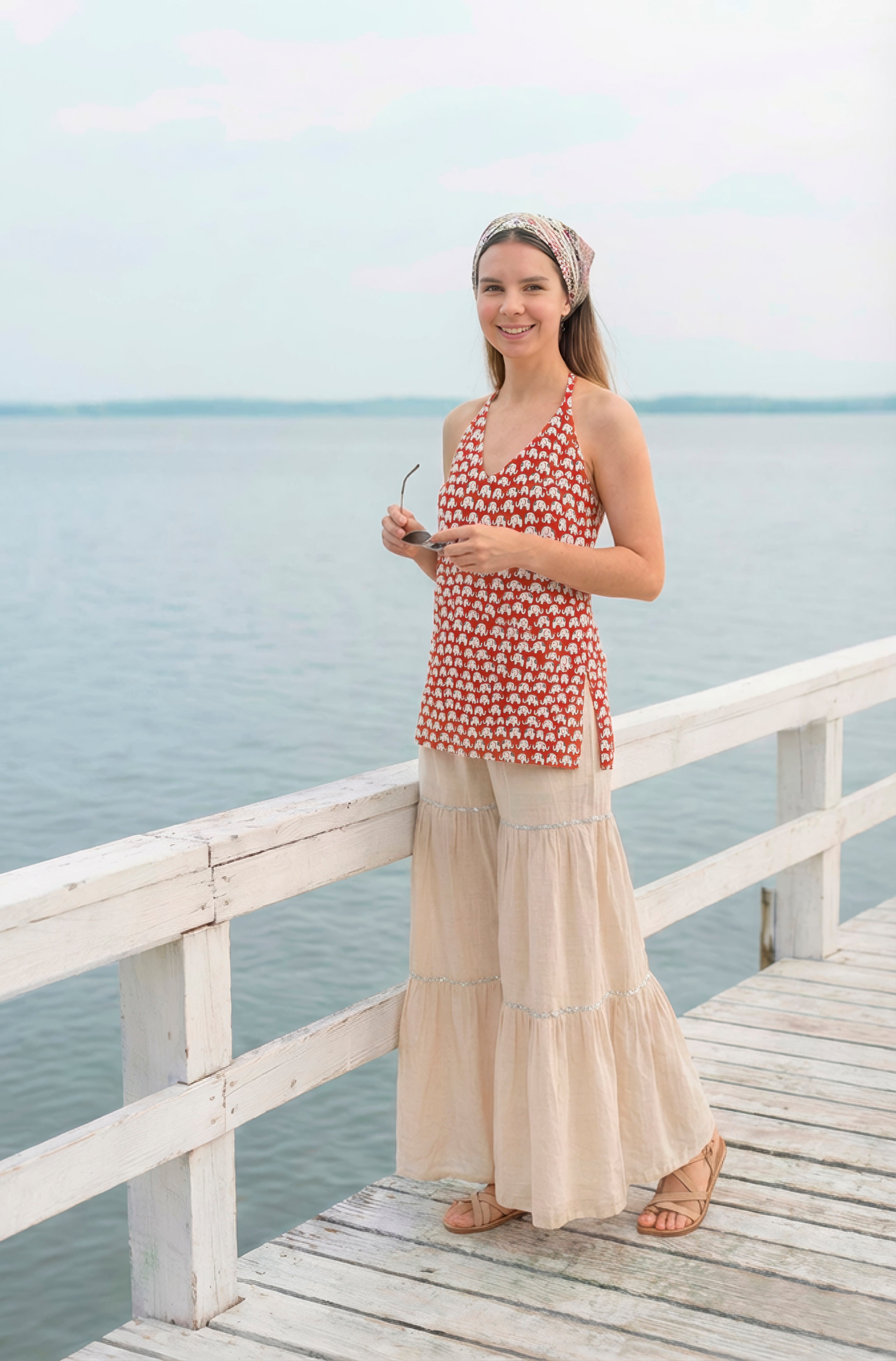 Sleeveless Halter Neck Red Kurti with Sharara and Stylised Back Dori Design