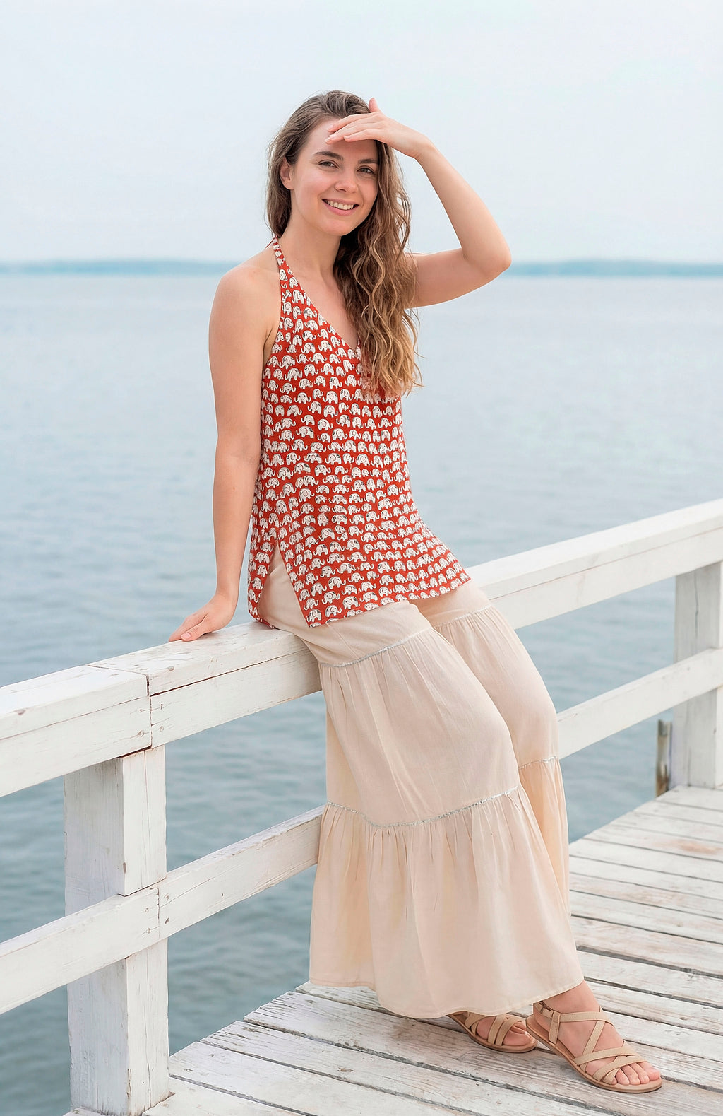 Sleeveless Halter Neck Red Kurti with Sharara and Stylised Back Dori Design