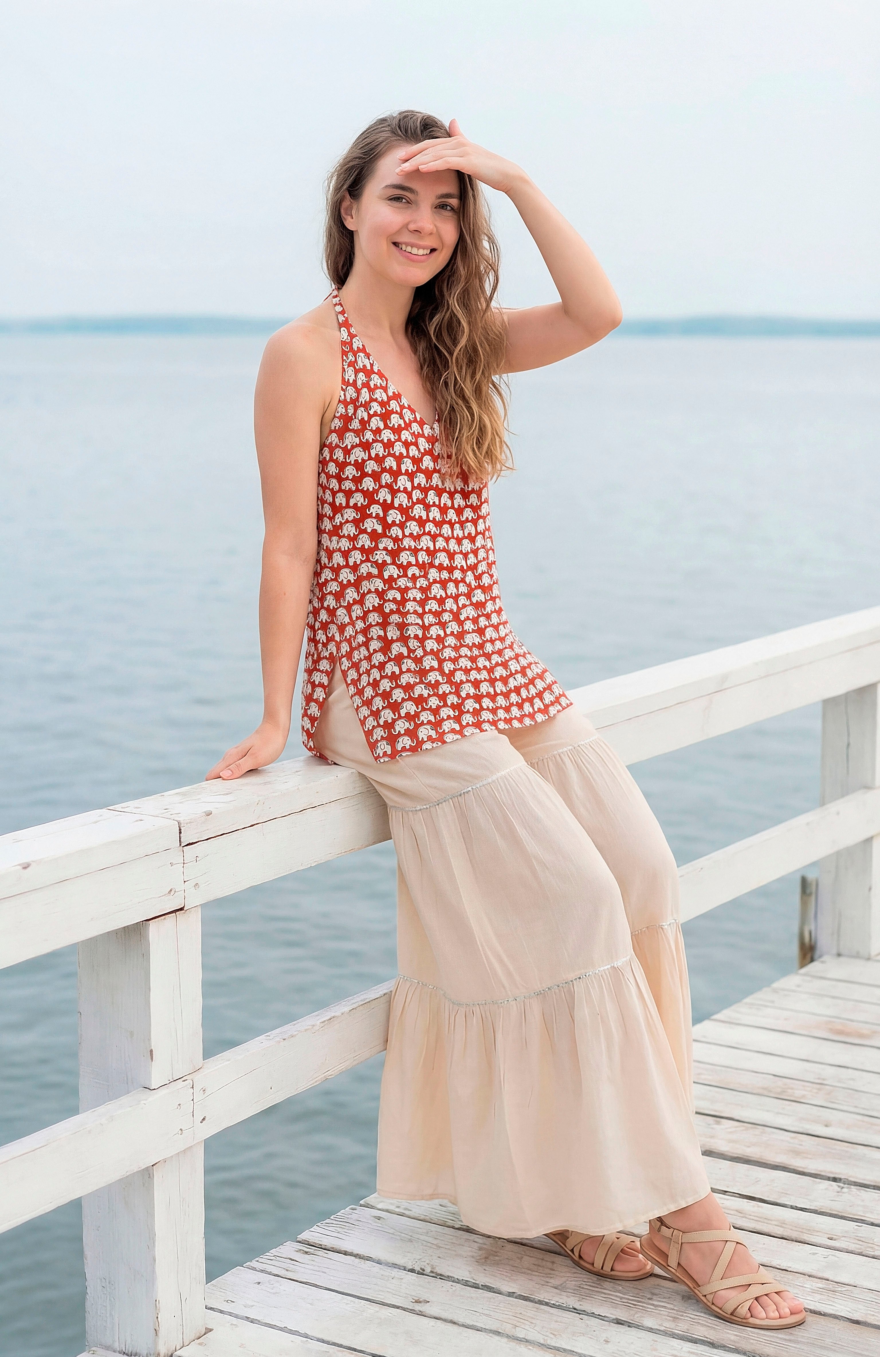 Sleeveless Halter Neck Red Kurti with Sharara and Stylised Back Dori Design