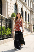 Sleeveless Halter Neck Red Kurti with Sharara and Stylised Back Dori Design