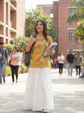 Sleeveless Yellow Cotton Kurti with Layered Gotta Patti Skirt and stylised Back Dori Design