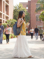 Sleeveless Yellow Cotton Kurti with Layered Gotta Patti Skirt and stylised Back Dori Design