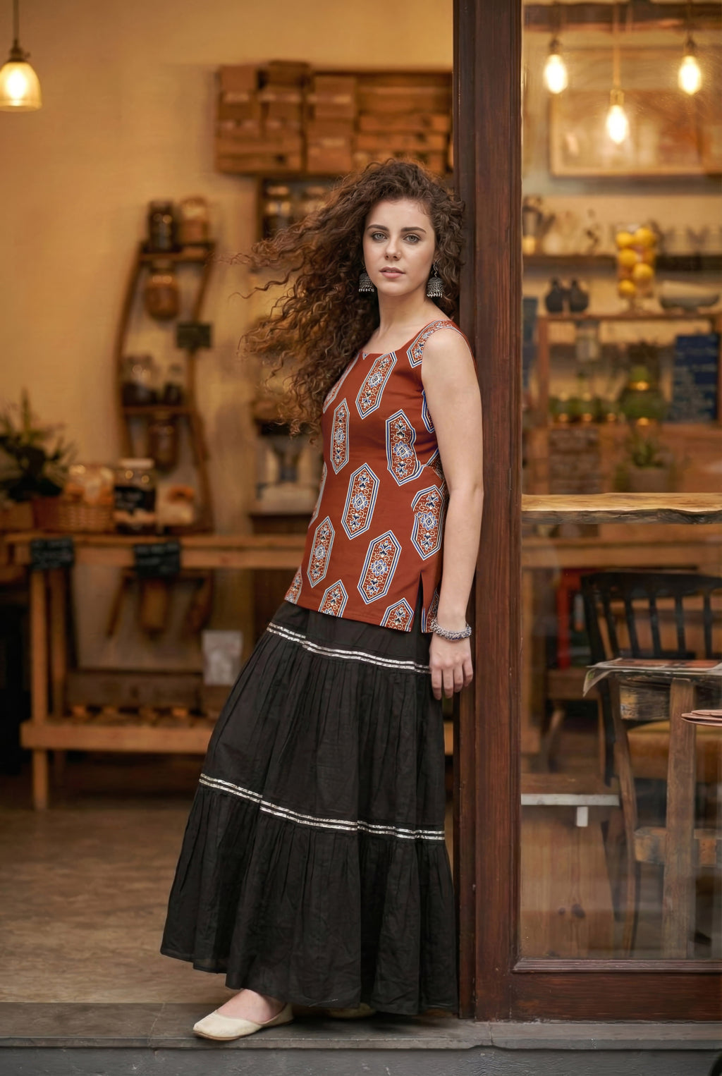 Sleeveless Red Cotton Kurti with Layered Gotta Patti Skirt and stylised Back Dori Design