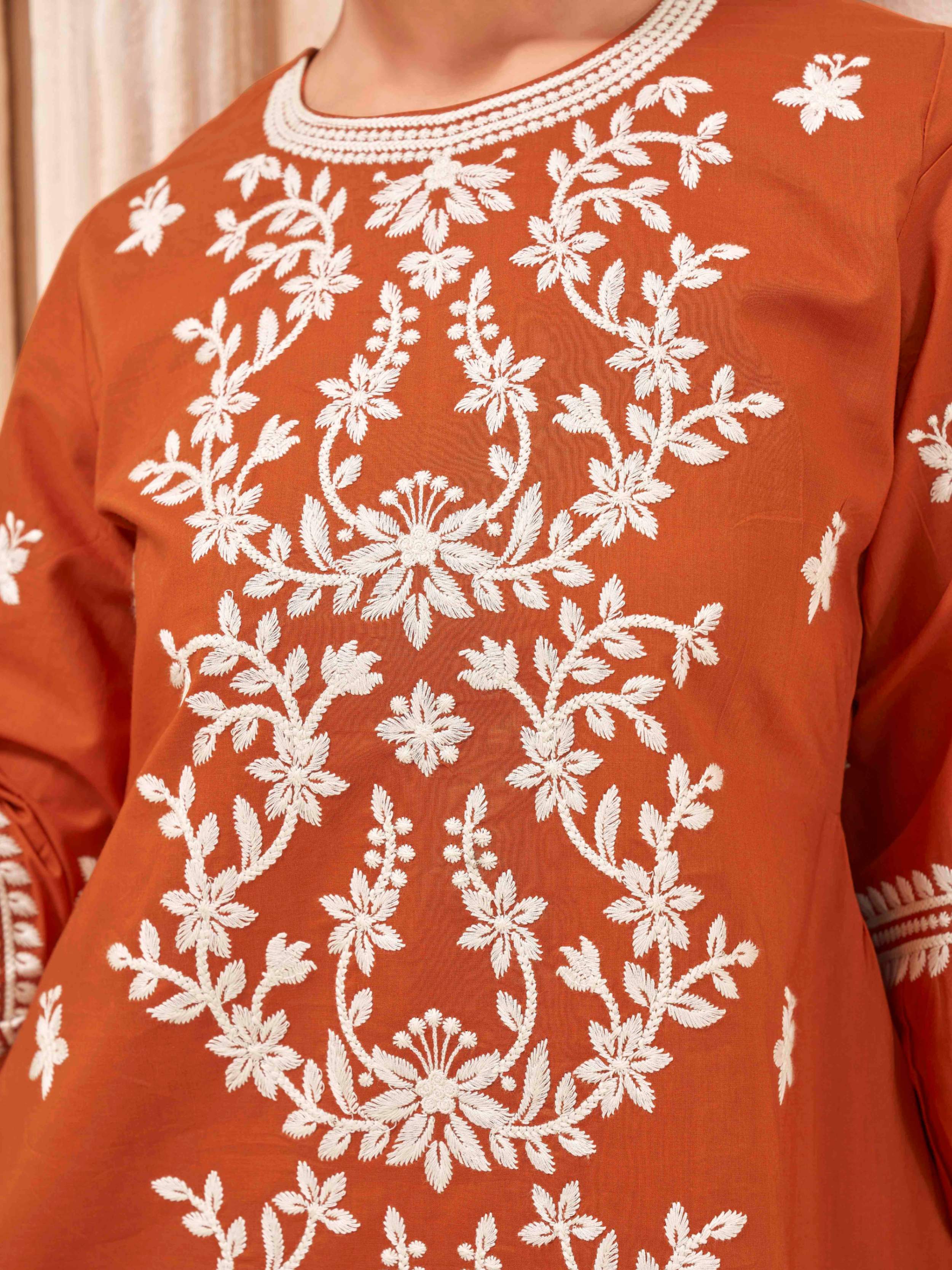 Rust color pure cotton with white thread embroidered tunic and plazzo cordset