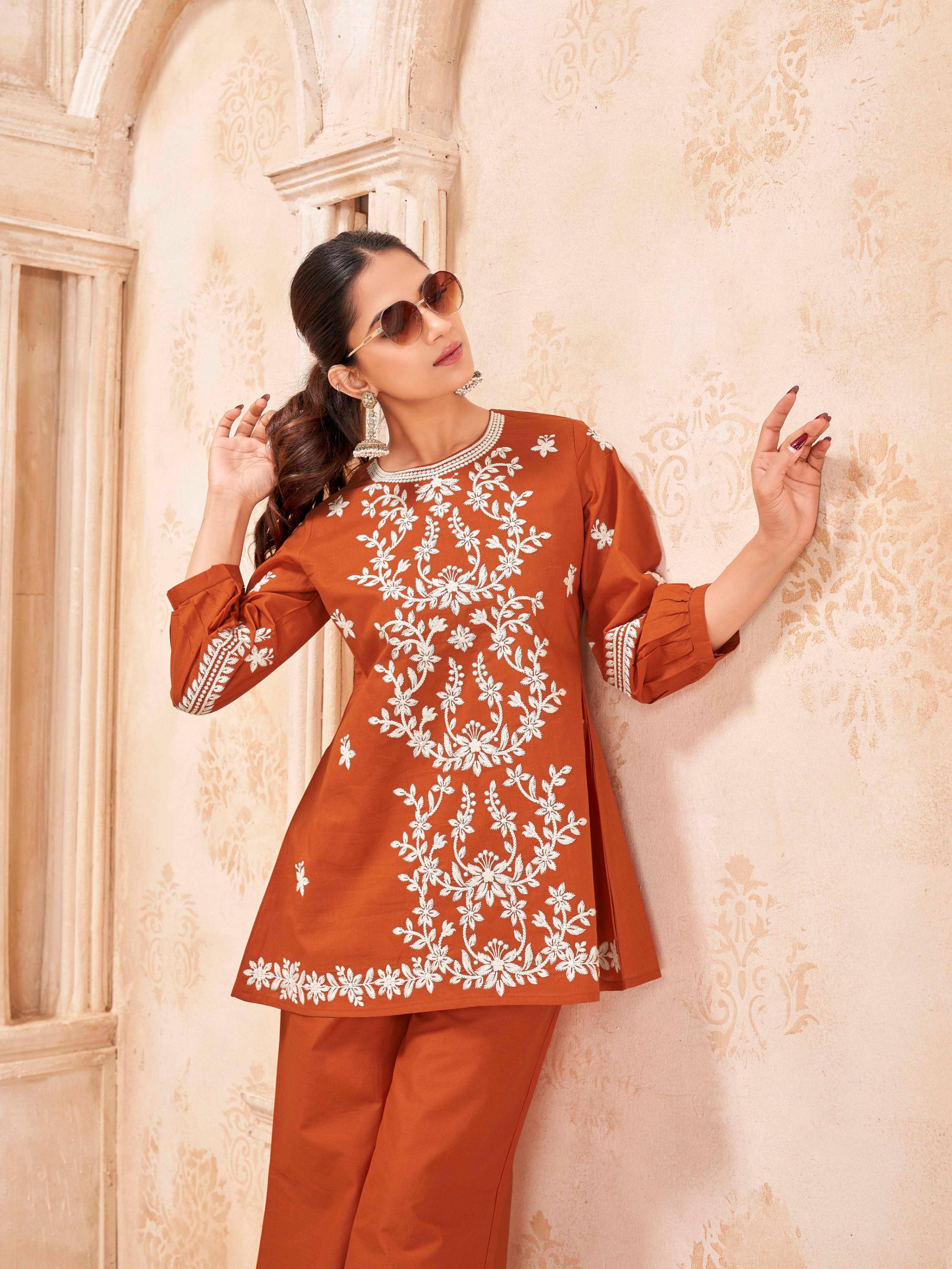 Rust color pure cotton with white thread embroidered tunic and plazzo cordset