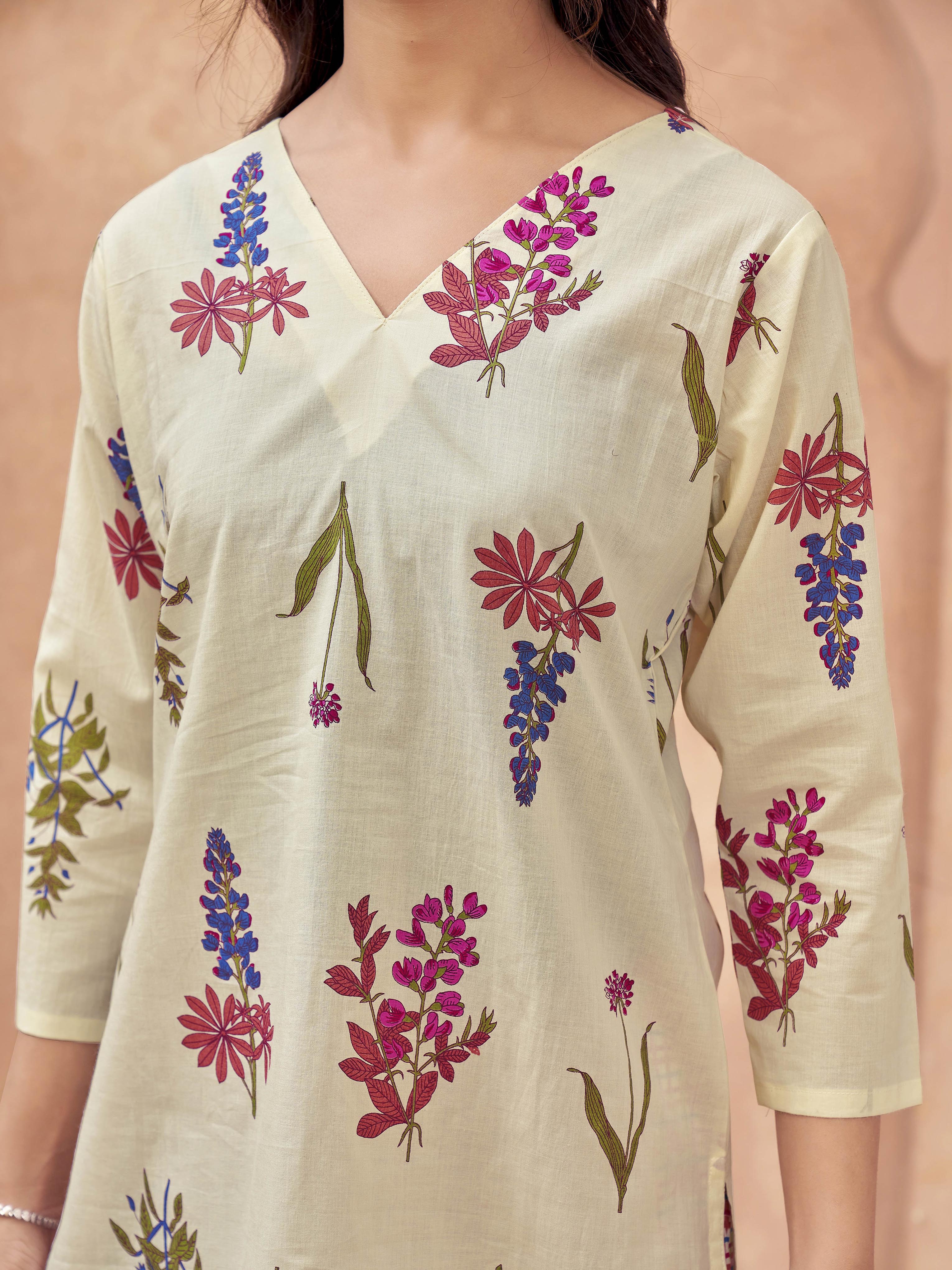 Off white color pure cotton with floral printed tunic & checks printed farsi salwar co-ord set