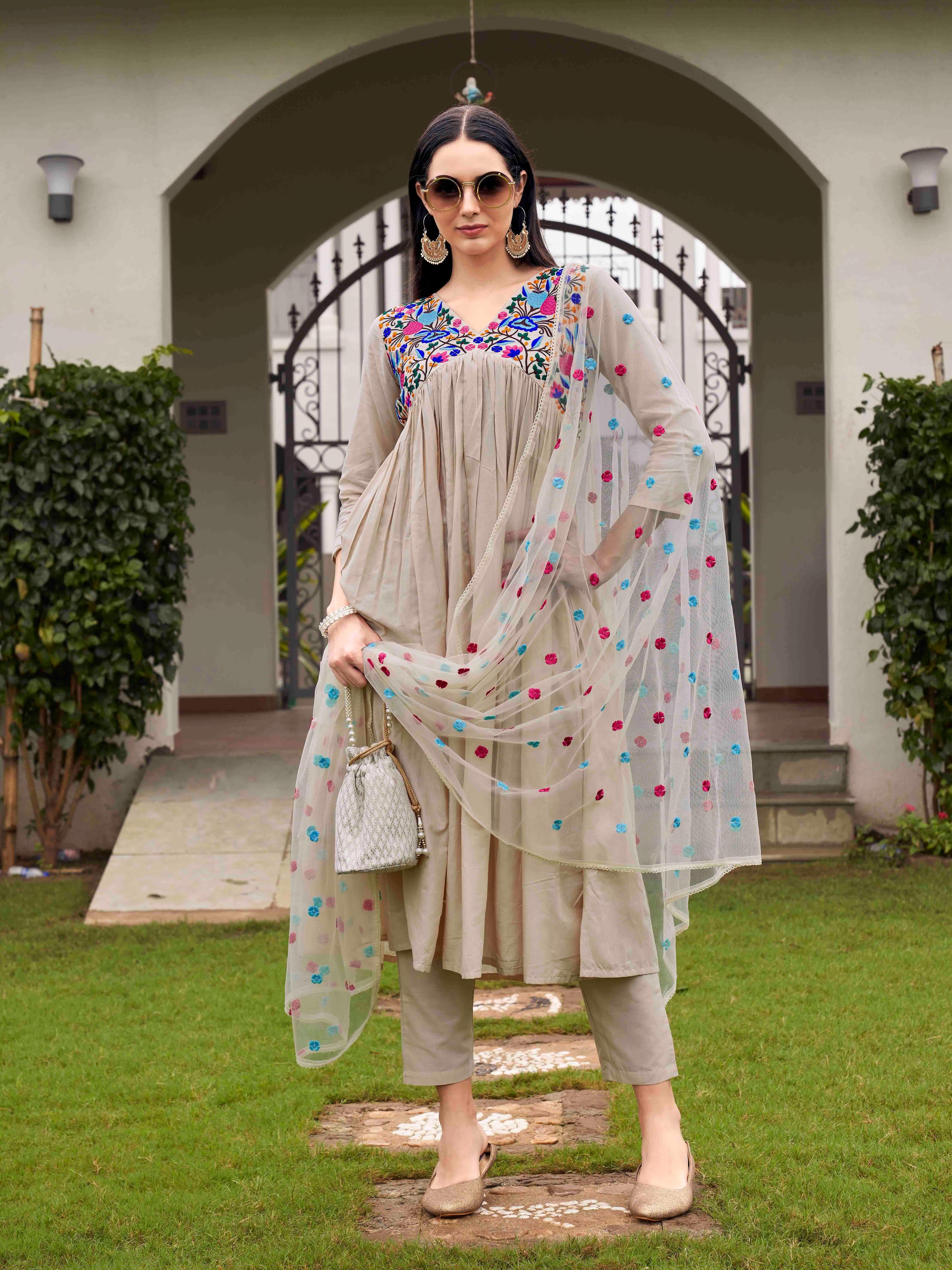 Lavender Color Pure Cotton Parsi Embroidered Flared Kurta Set