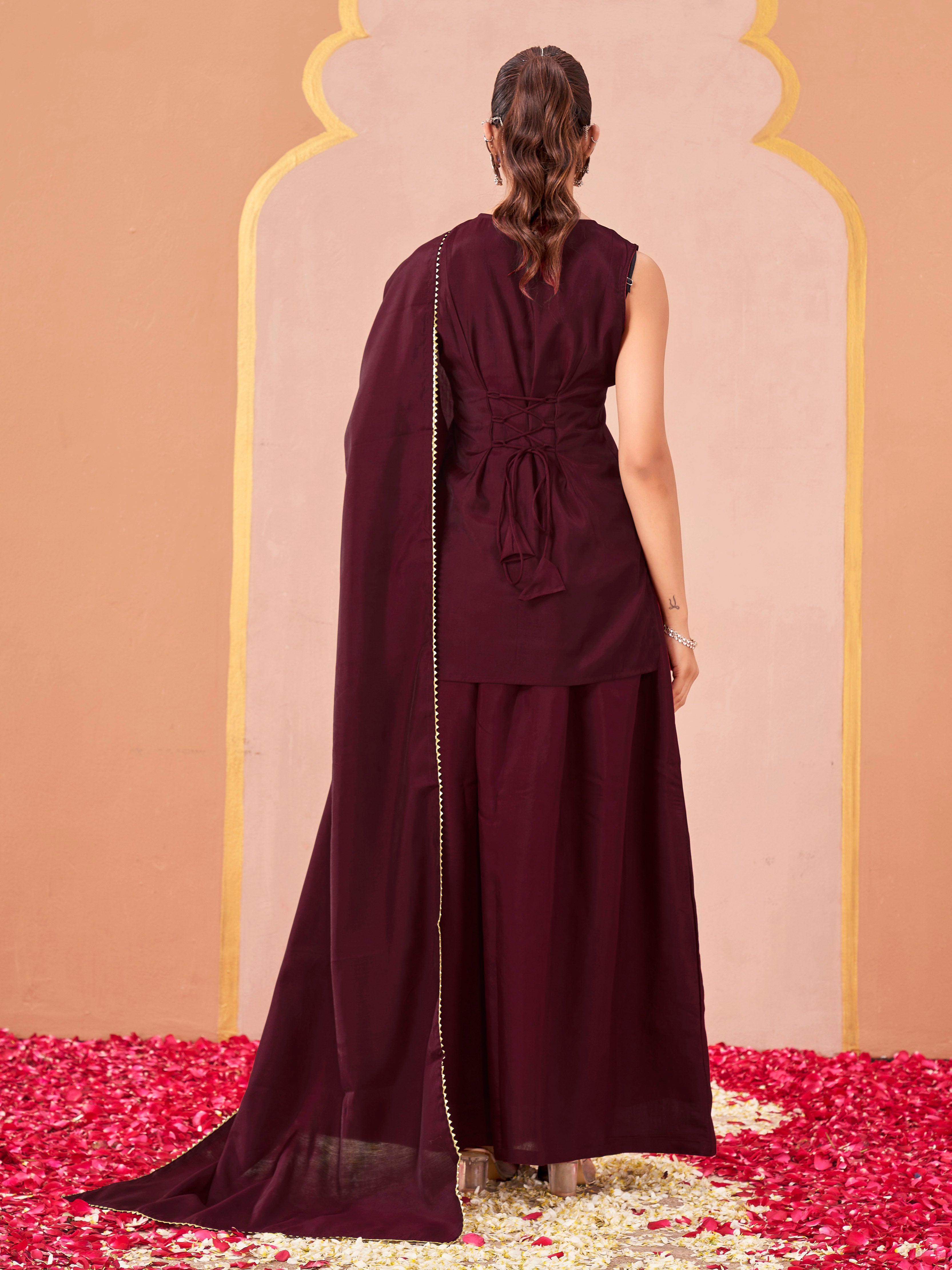 Maroon color silk blend solid back dori design kurta & skirt with dupatta