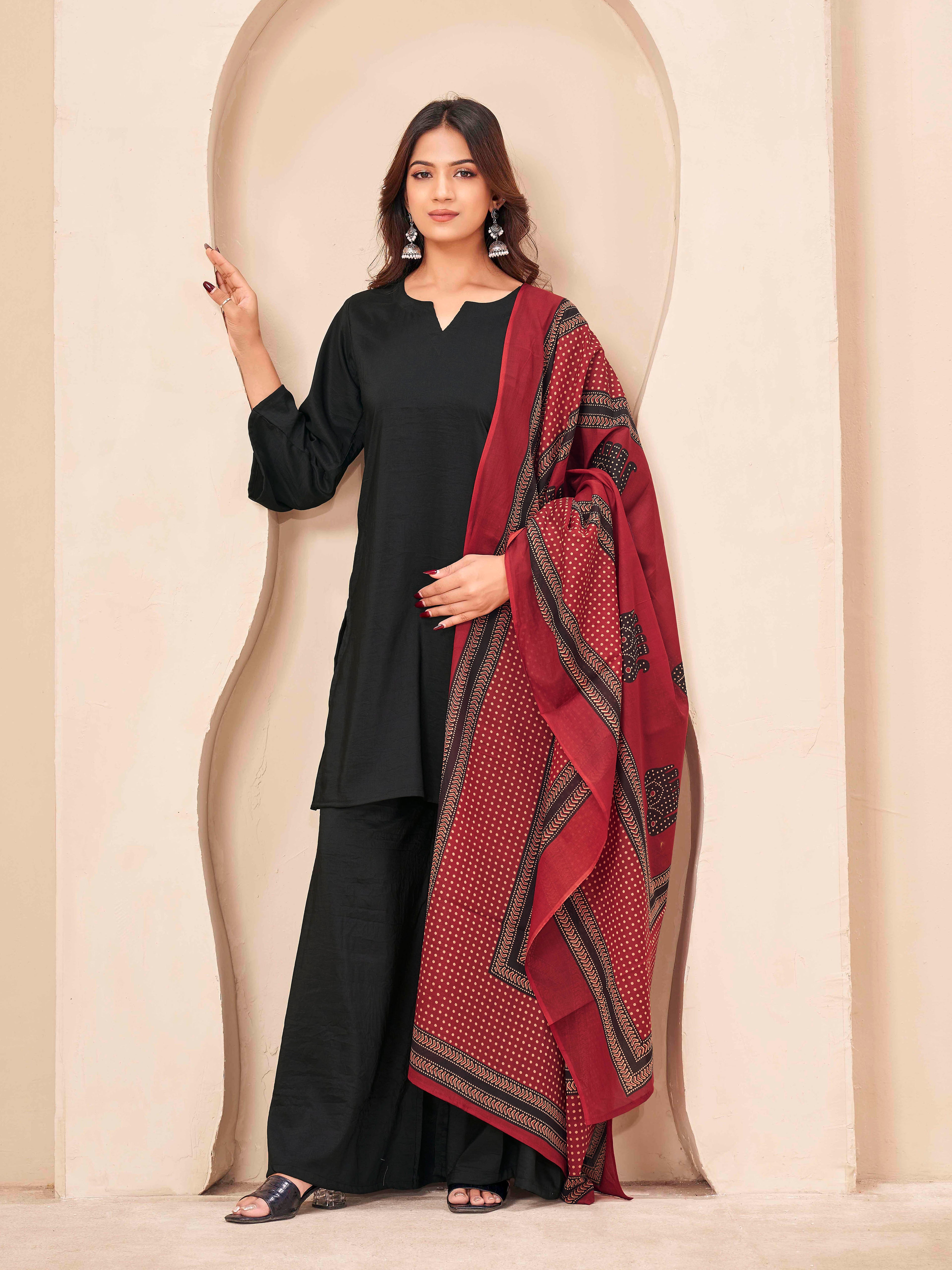 Black color silk blend solid kurta & a-line plazzo with printed dupatta set
